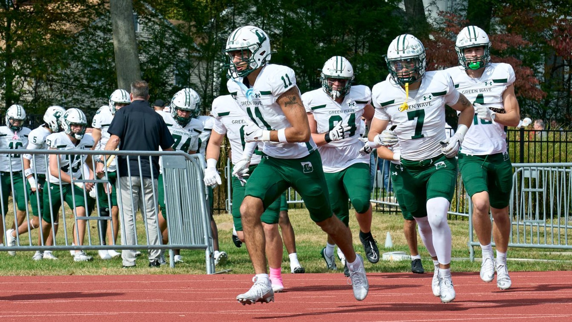 team running onto the field