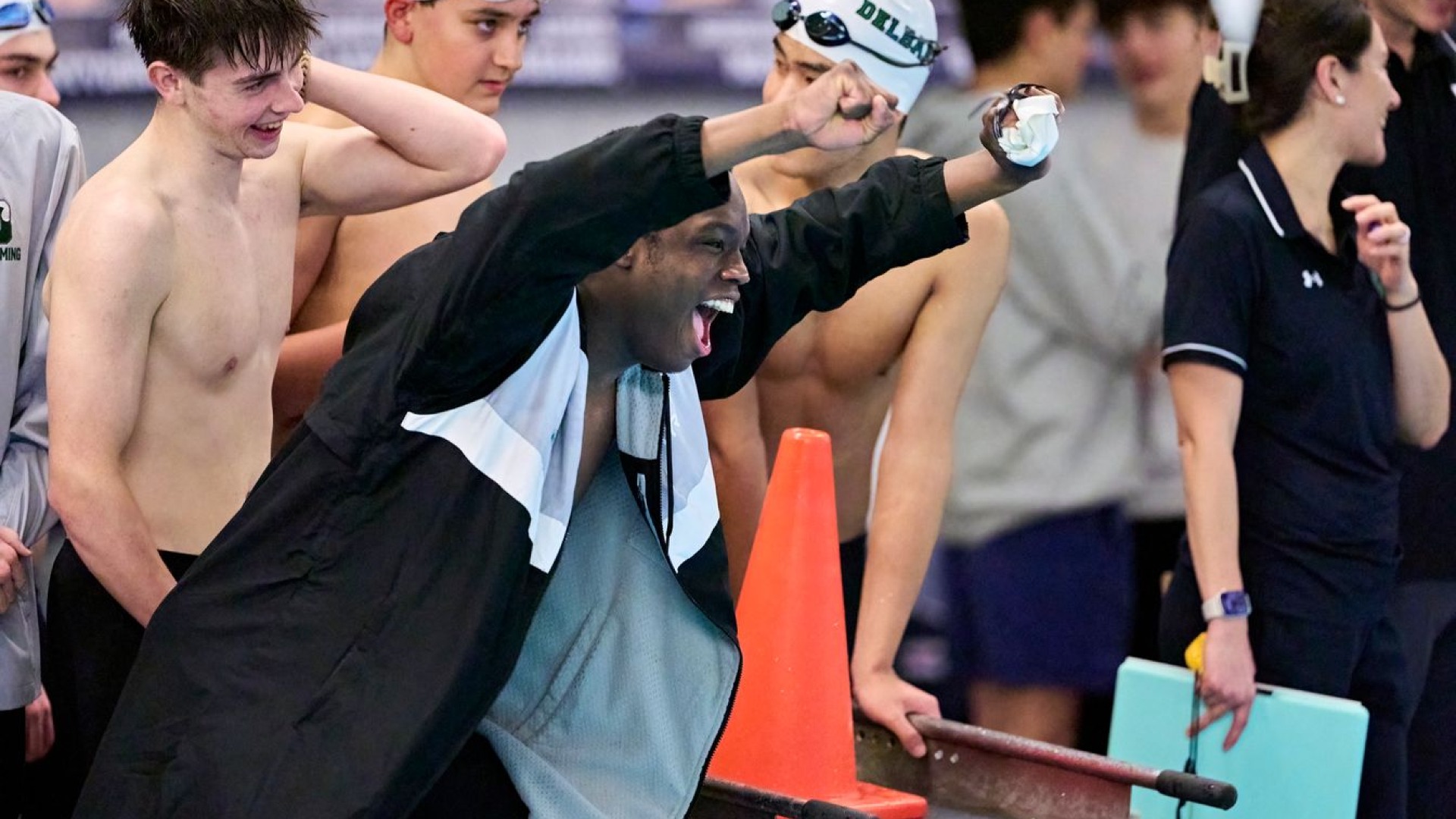 swim team celebrates