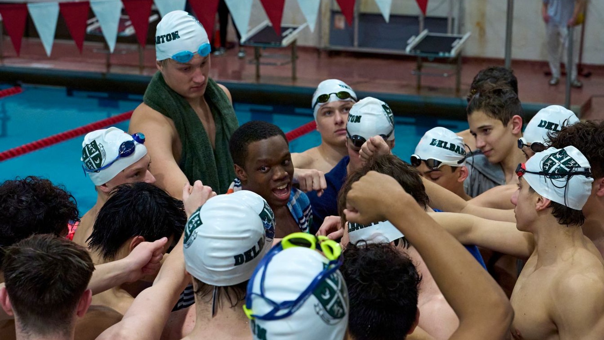 swim team huddle before meet