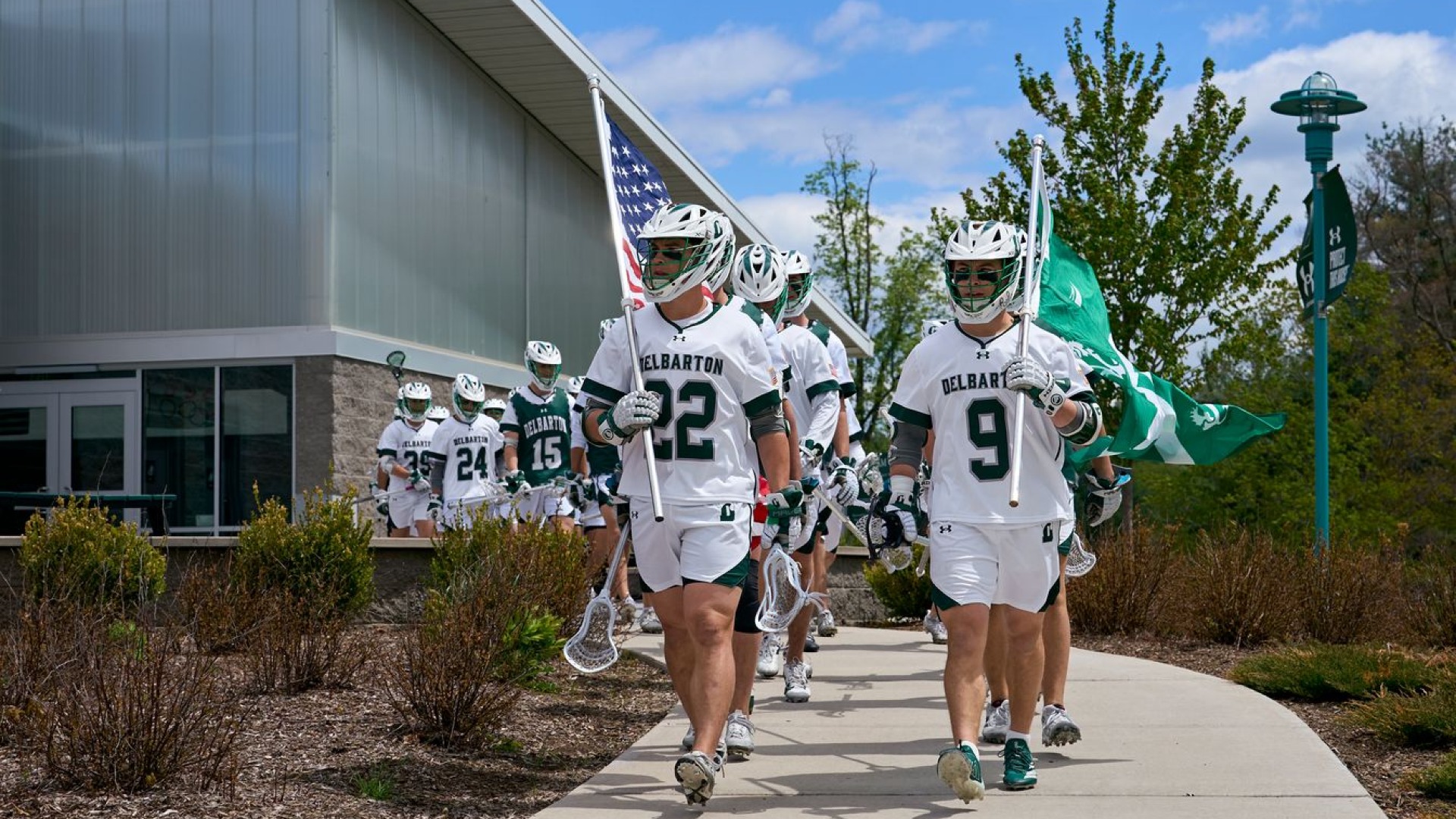 lax captains walk in with flags
