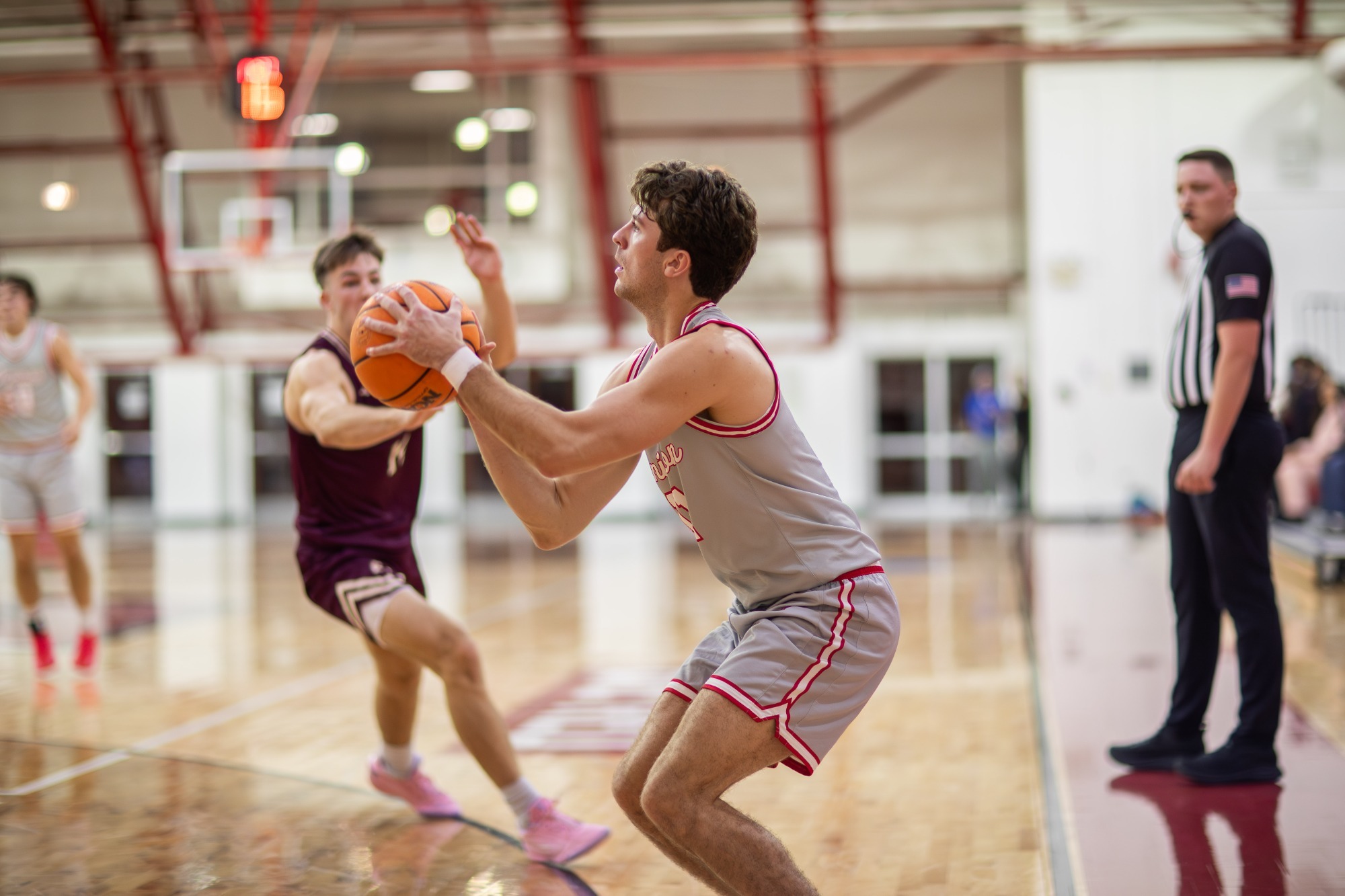 Nick Heath loads a corner three