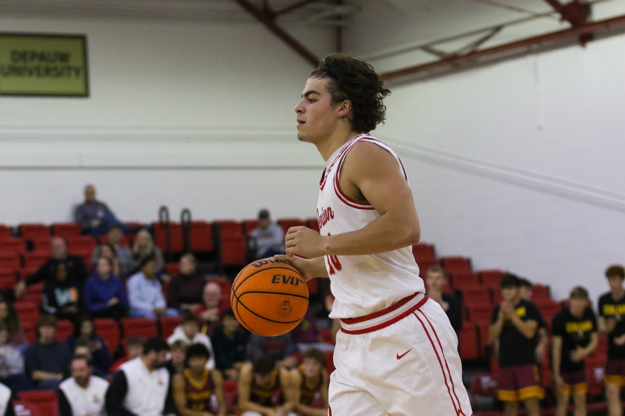 Owen Giannoulias dribbling ball down the floor