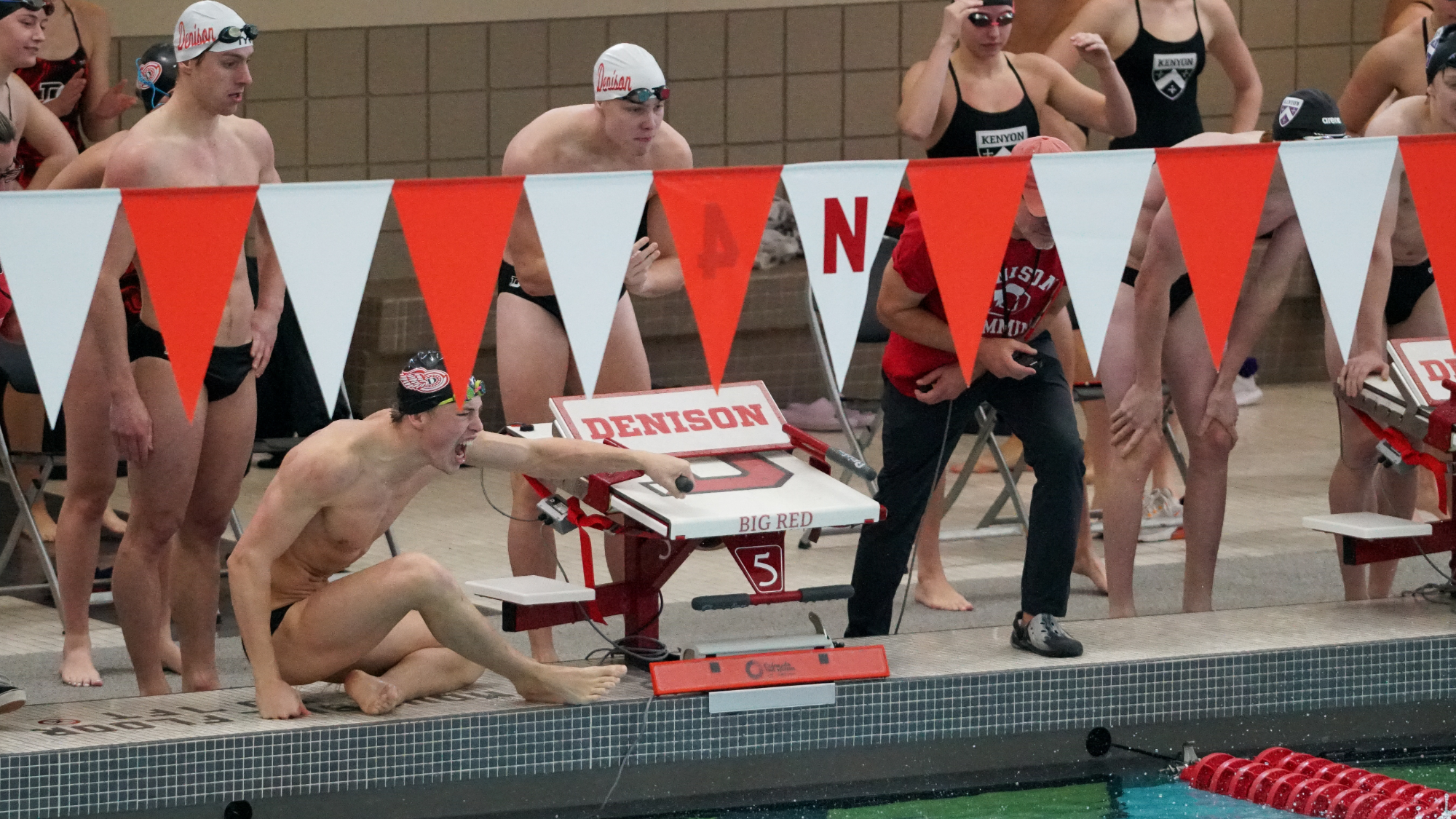 Relay celebrating their teammate