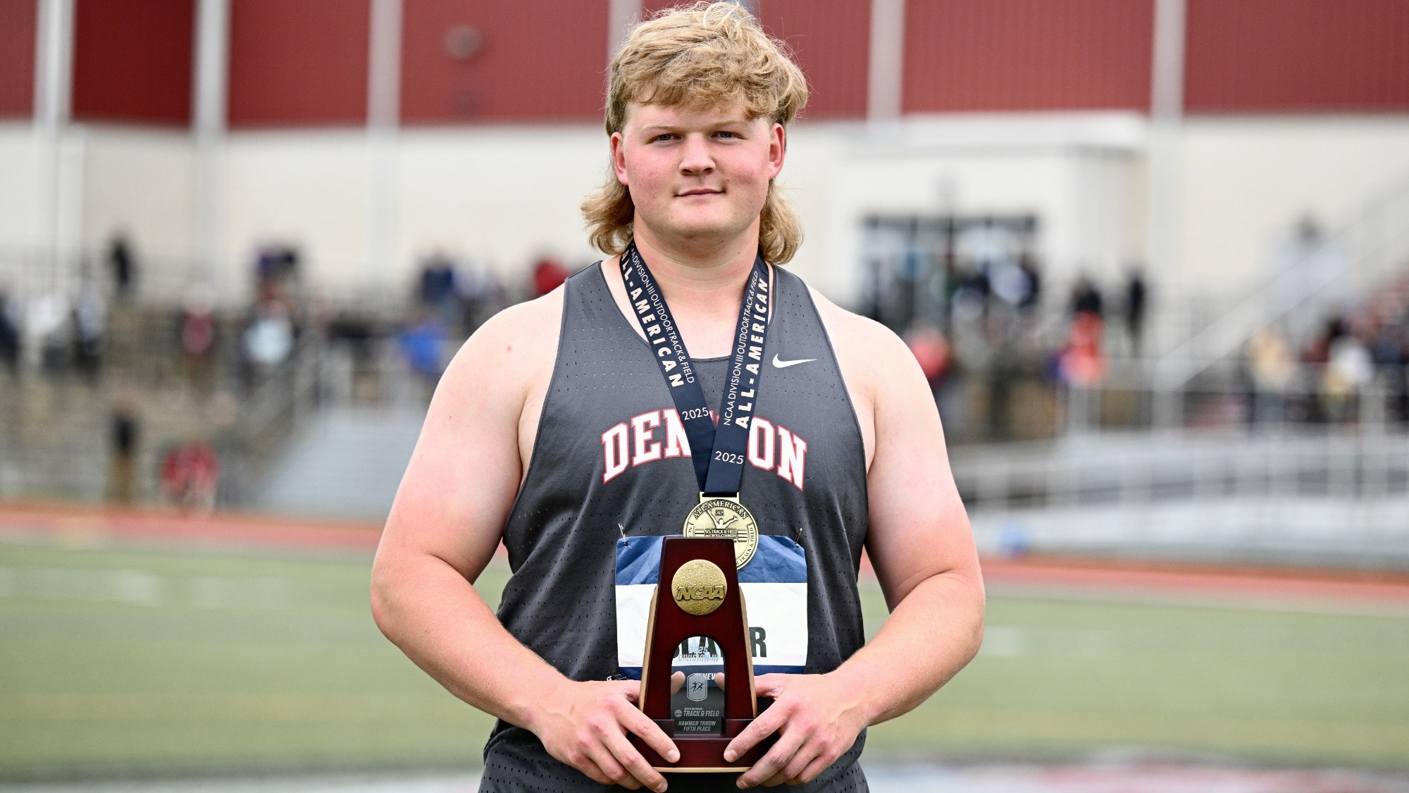 Slater with his All-American trophy