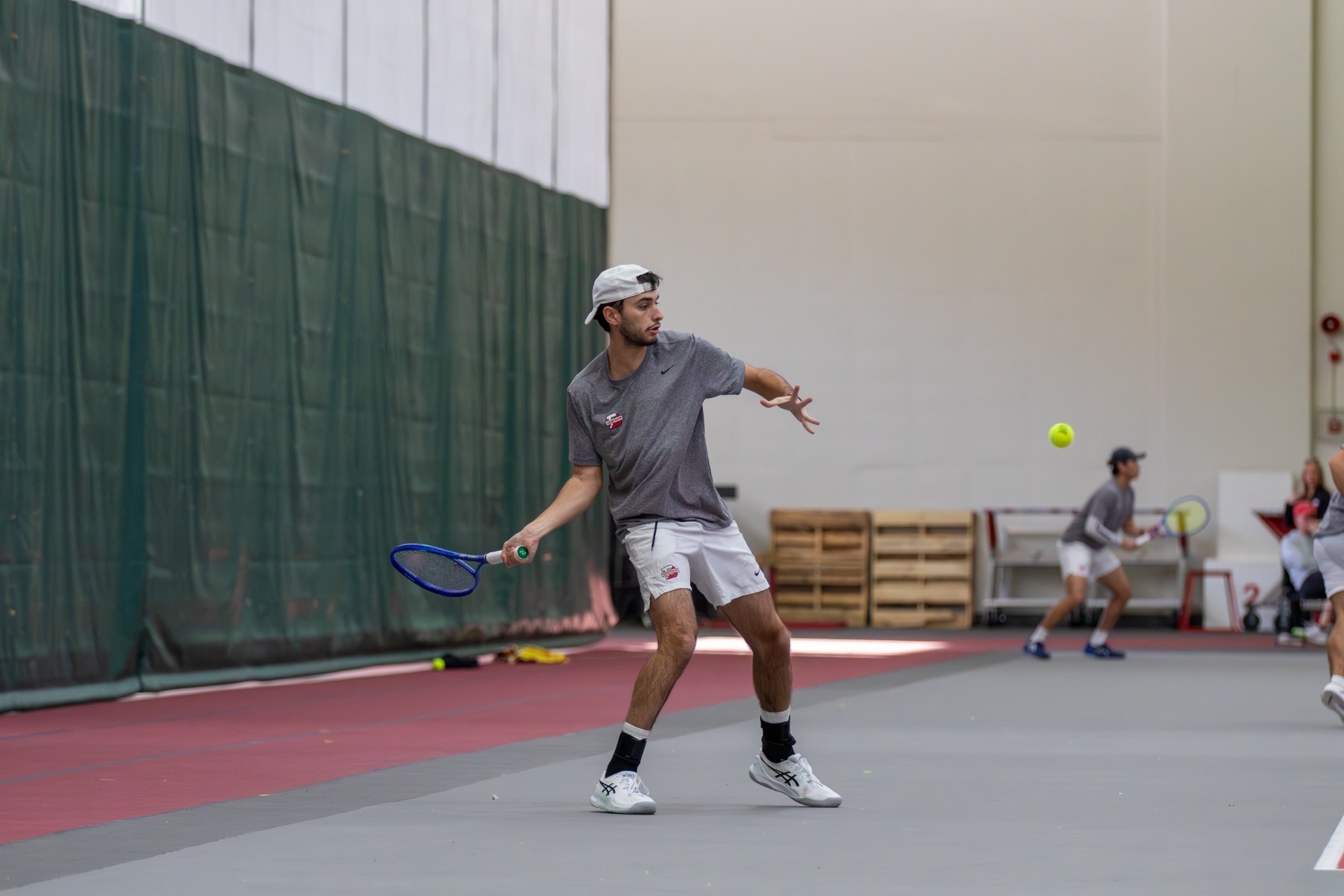 Anthony Payivalas returning serve