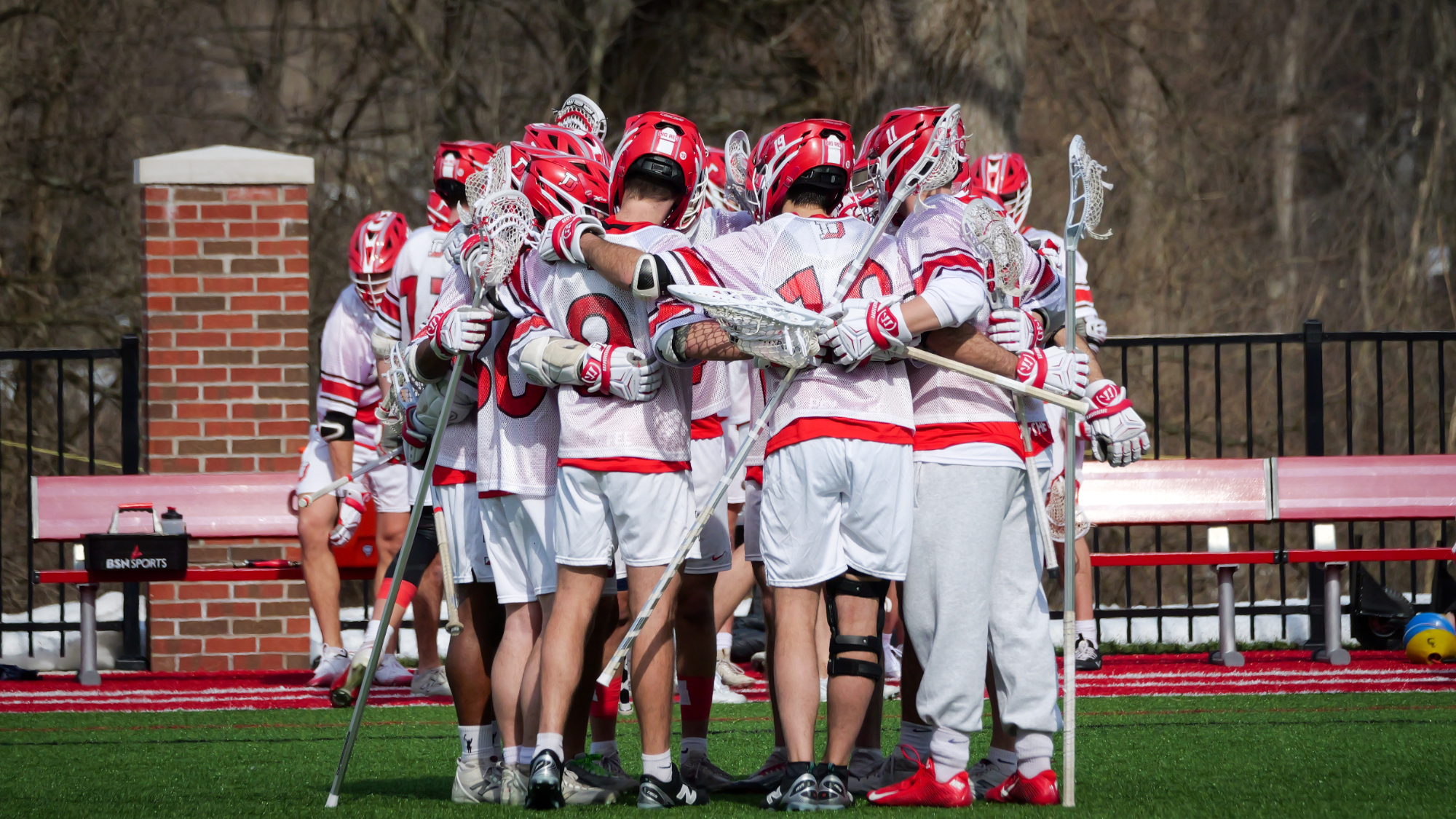 Men's lacrosse team huddle
