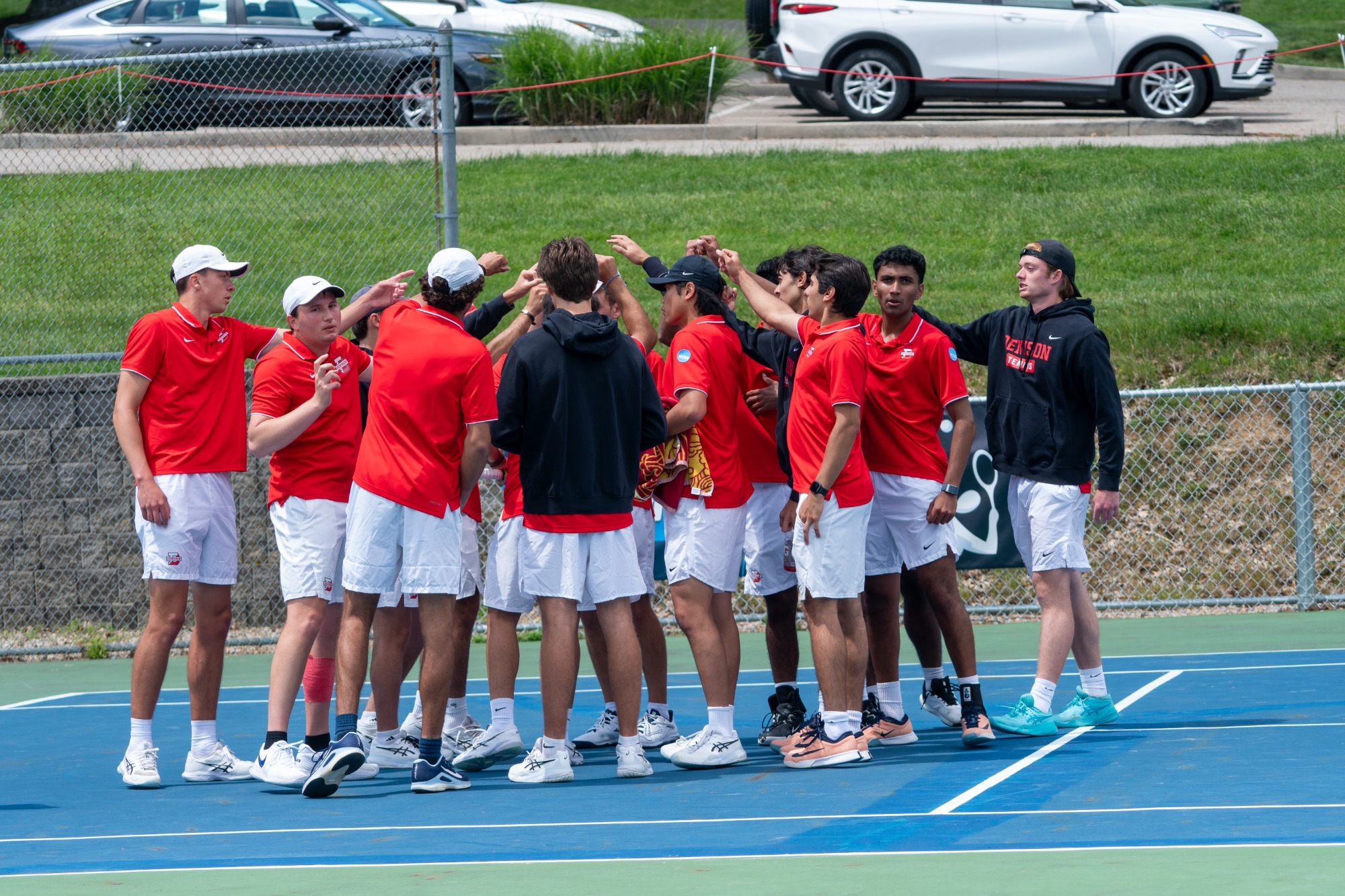 Men's Tennis Celebrating Win