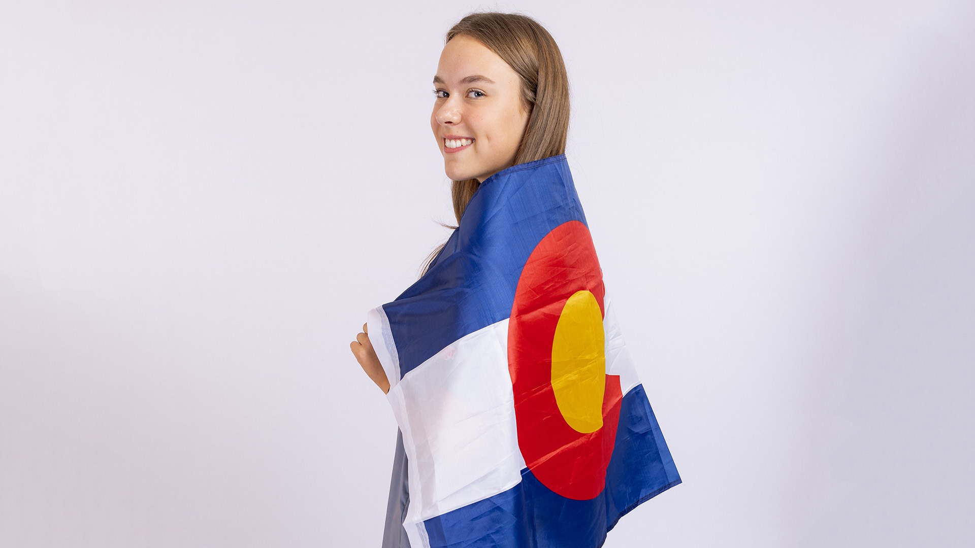 Reese Morgan Denver Women's Soccer Official Visit - Portrait with Colorado Flag