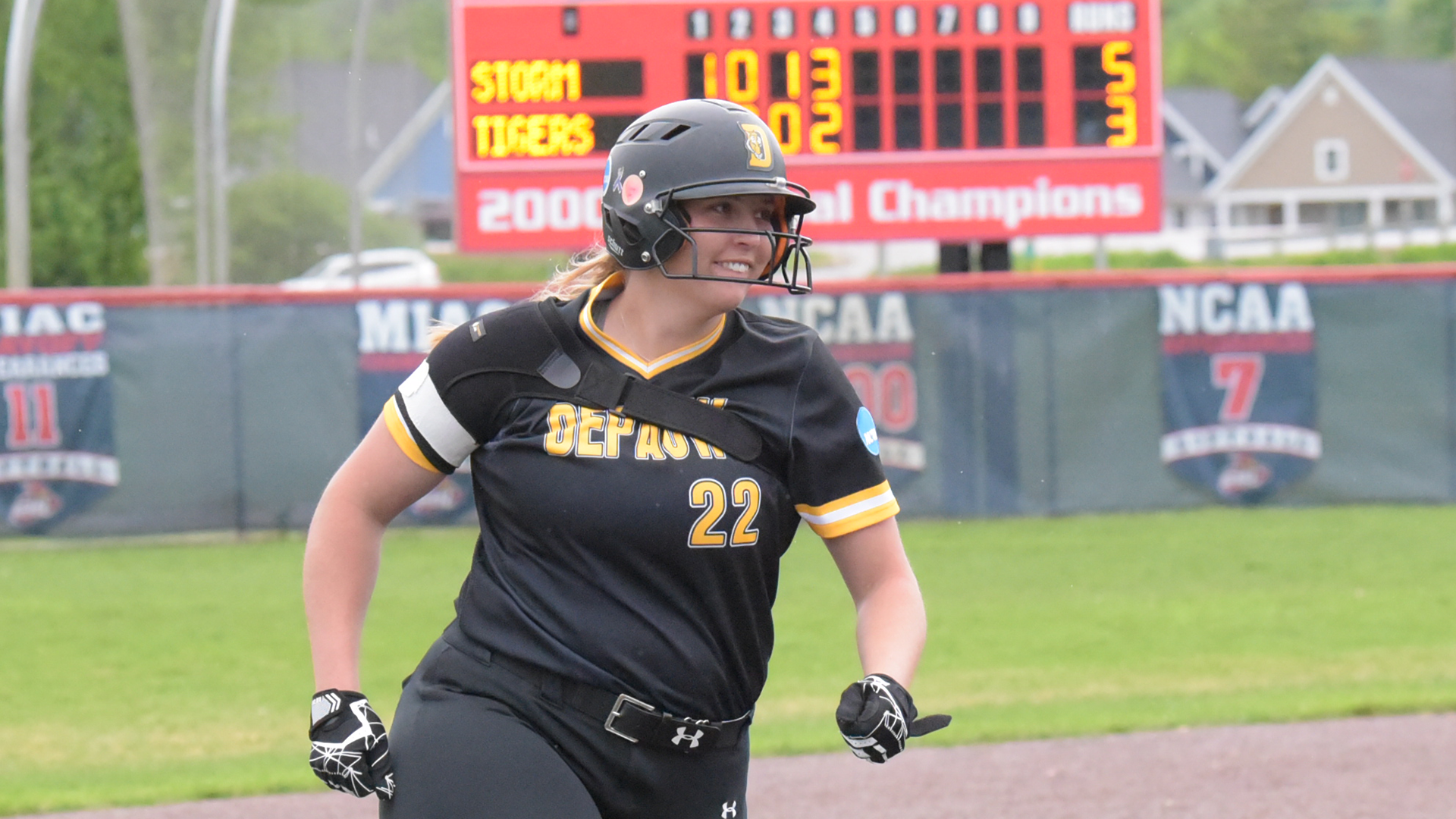 Callie Rheinheimer circling the bases after a home run in NCAA regional play