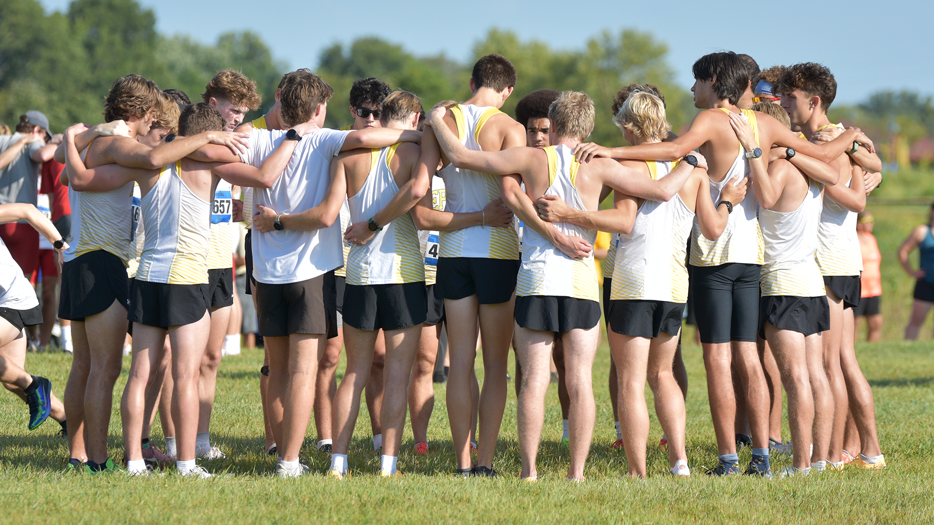 Men's cross country huddle