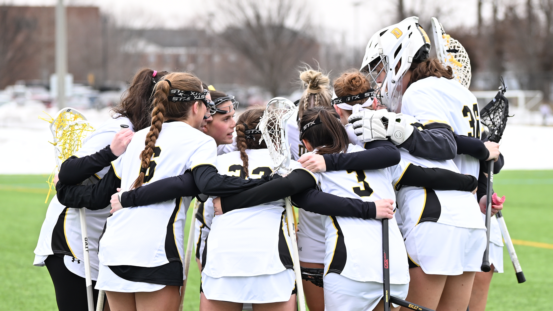 Women's lacrosse huddle