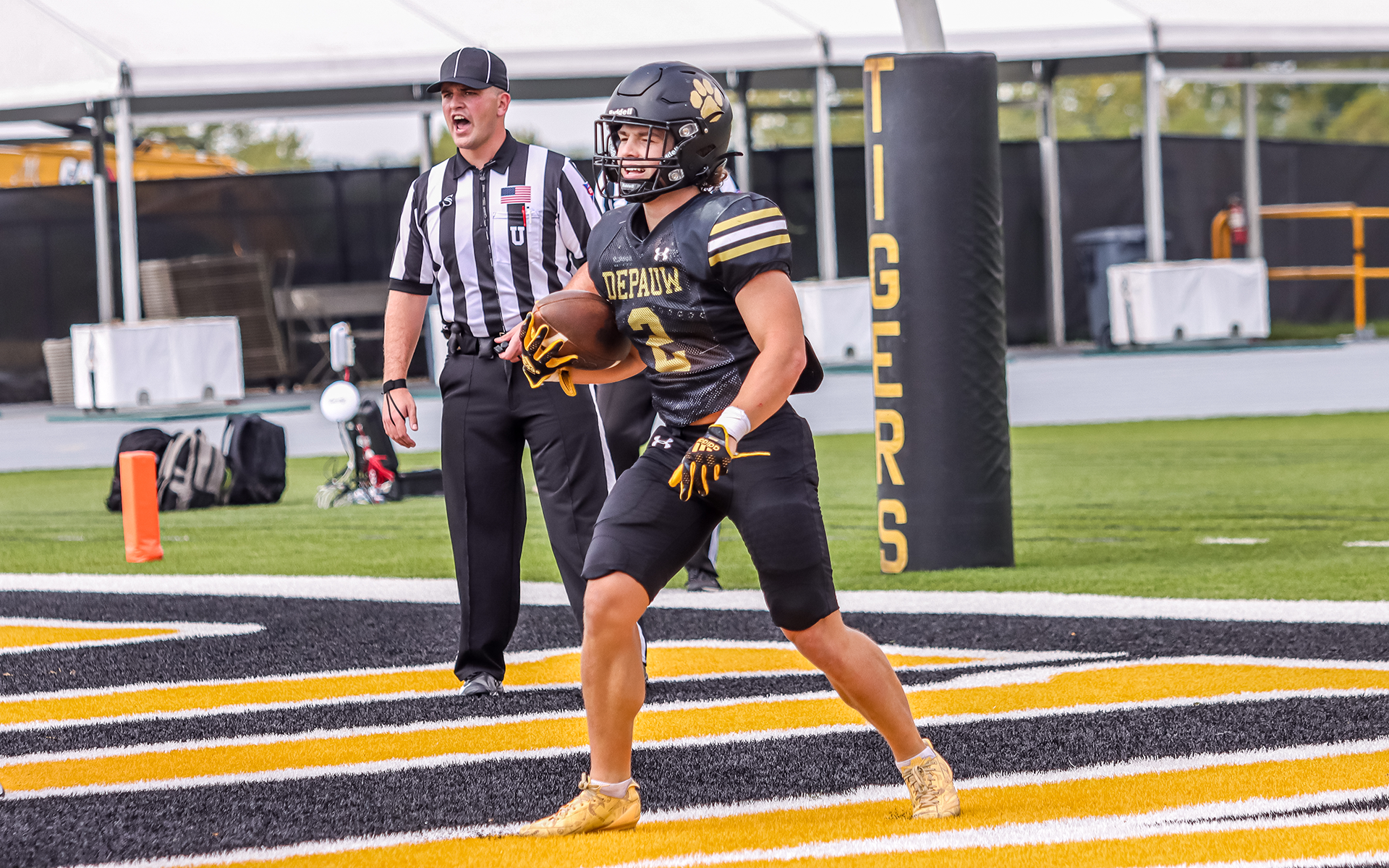 Carson Johnson with one of two touchdowns in 56-21 win over Ohio Wesleyan