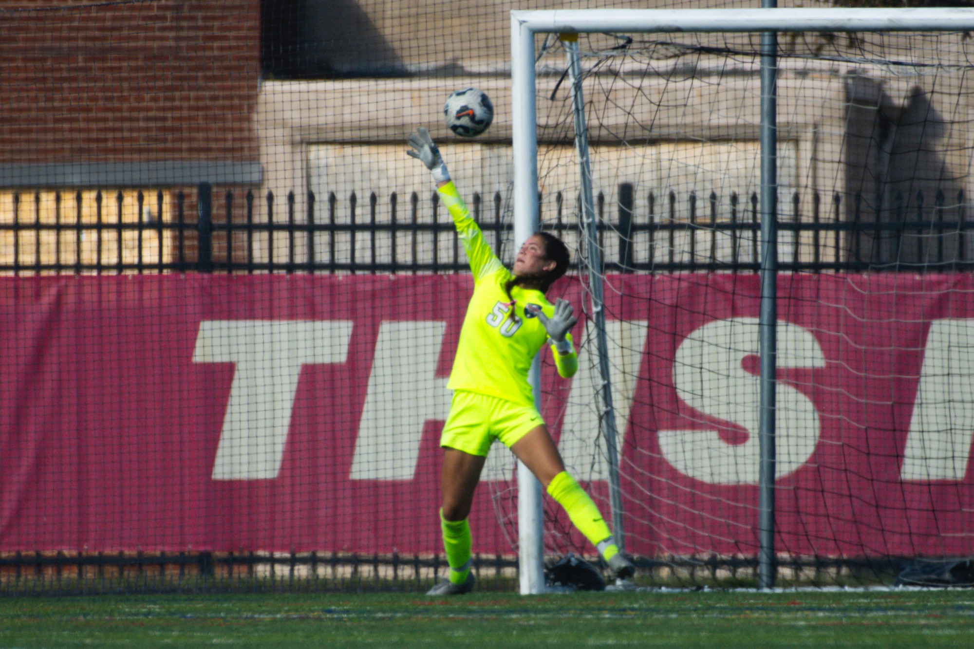 Eva Hill, junior goalkeeper, makes a save.