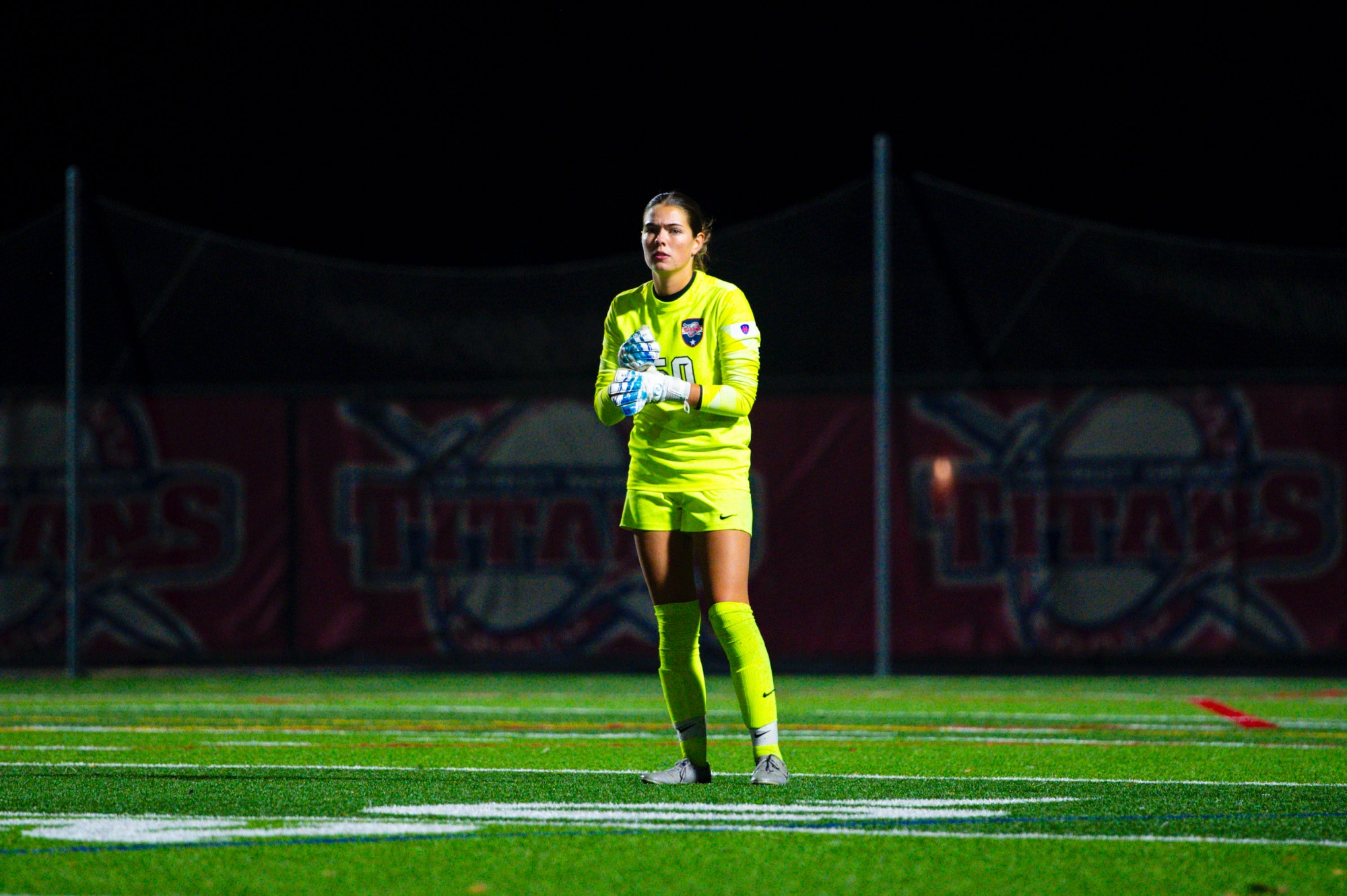 Eva Hill, junior goalkeeper, looks on.