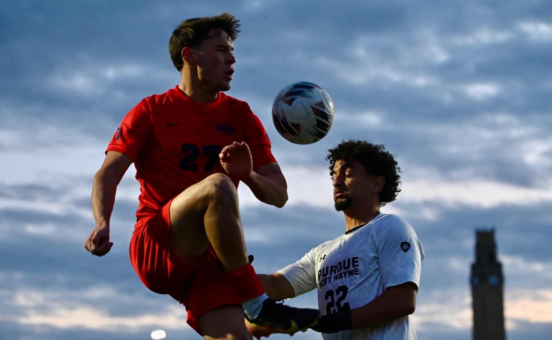 Drew Pierson goes up for the ball