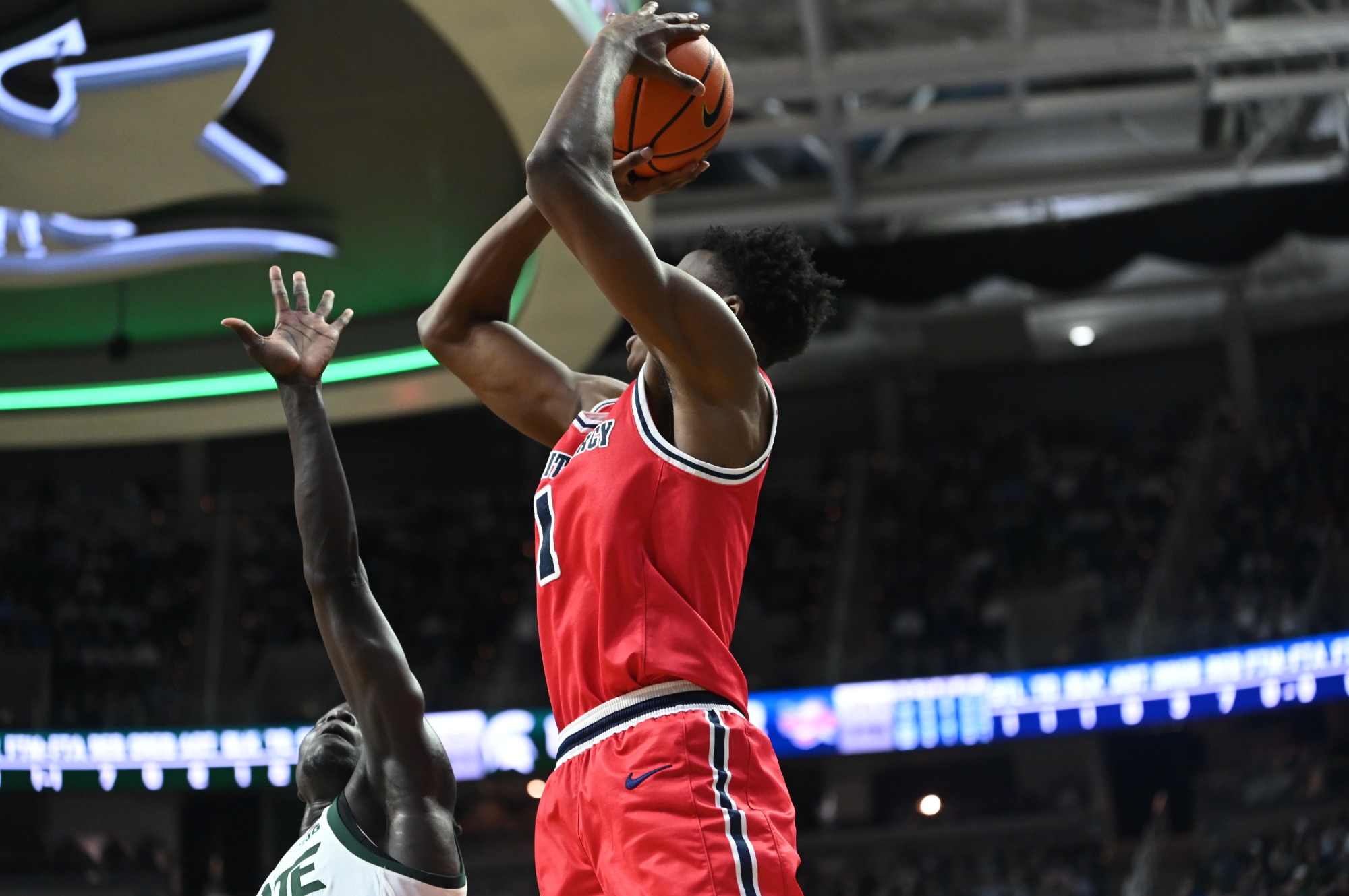 Tyler Spratt shoots a baseline jumper