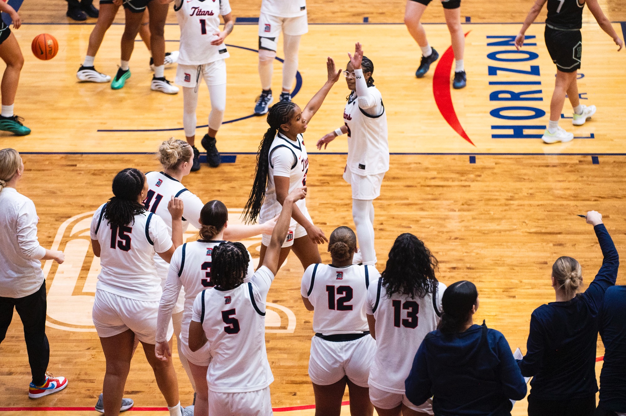 The Titans celebrate during a stoppage.