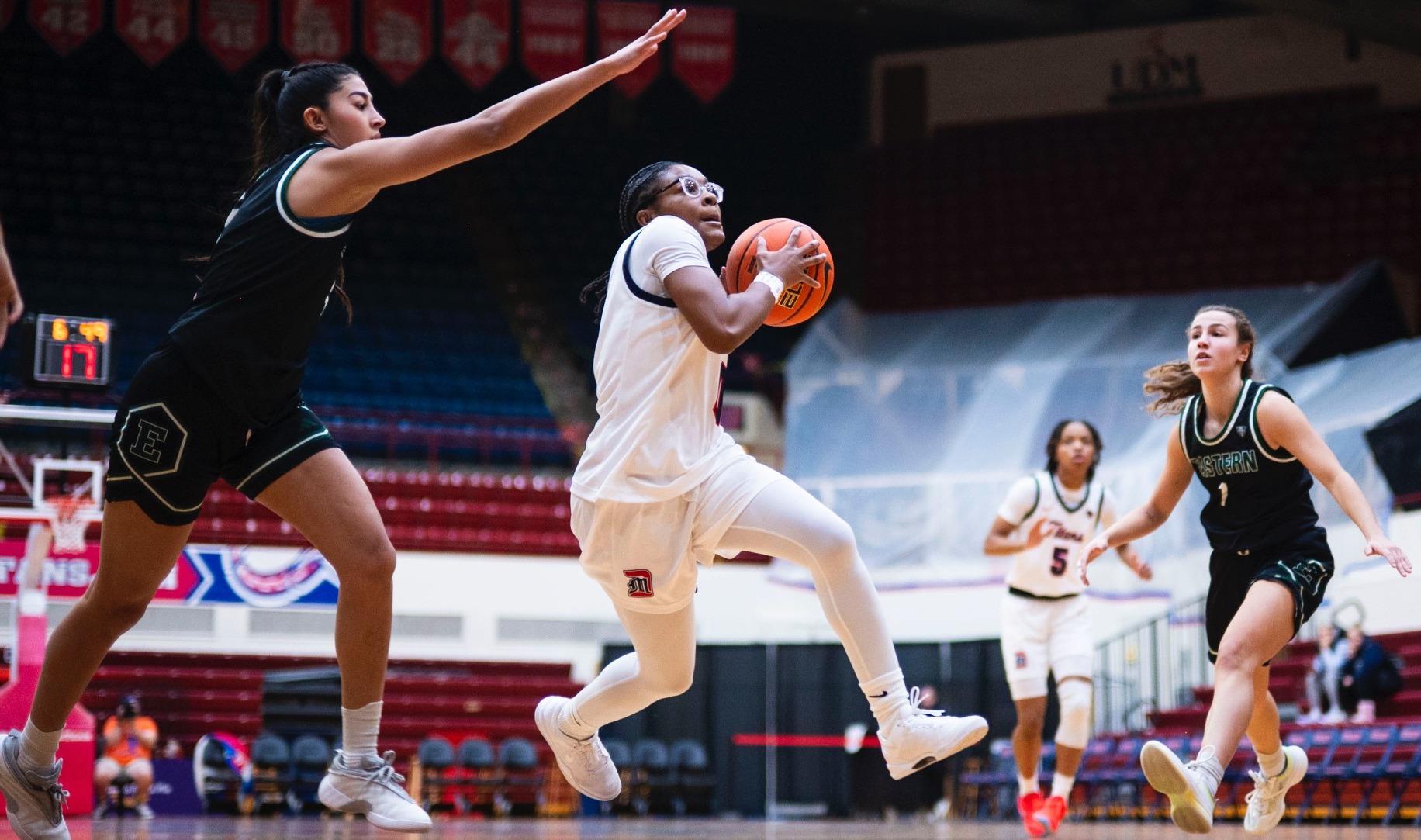 Burrell takes the ball to the rack vs EMU