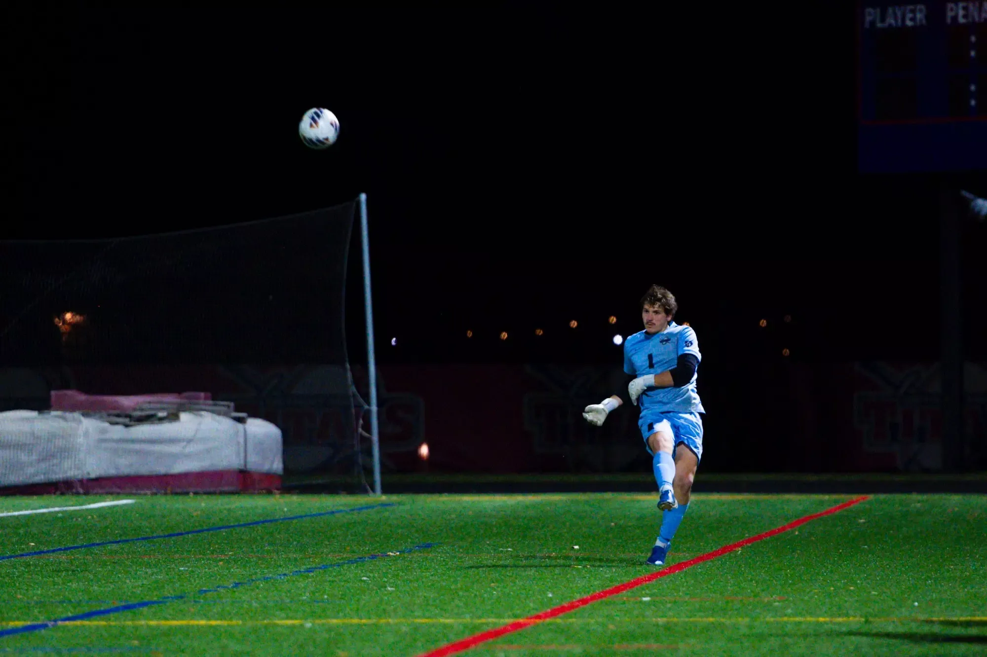 Quinn Tews, RS junior goalkeeper, passes.