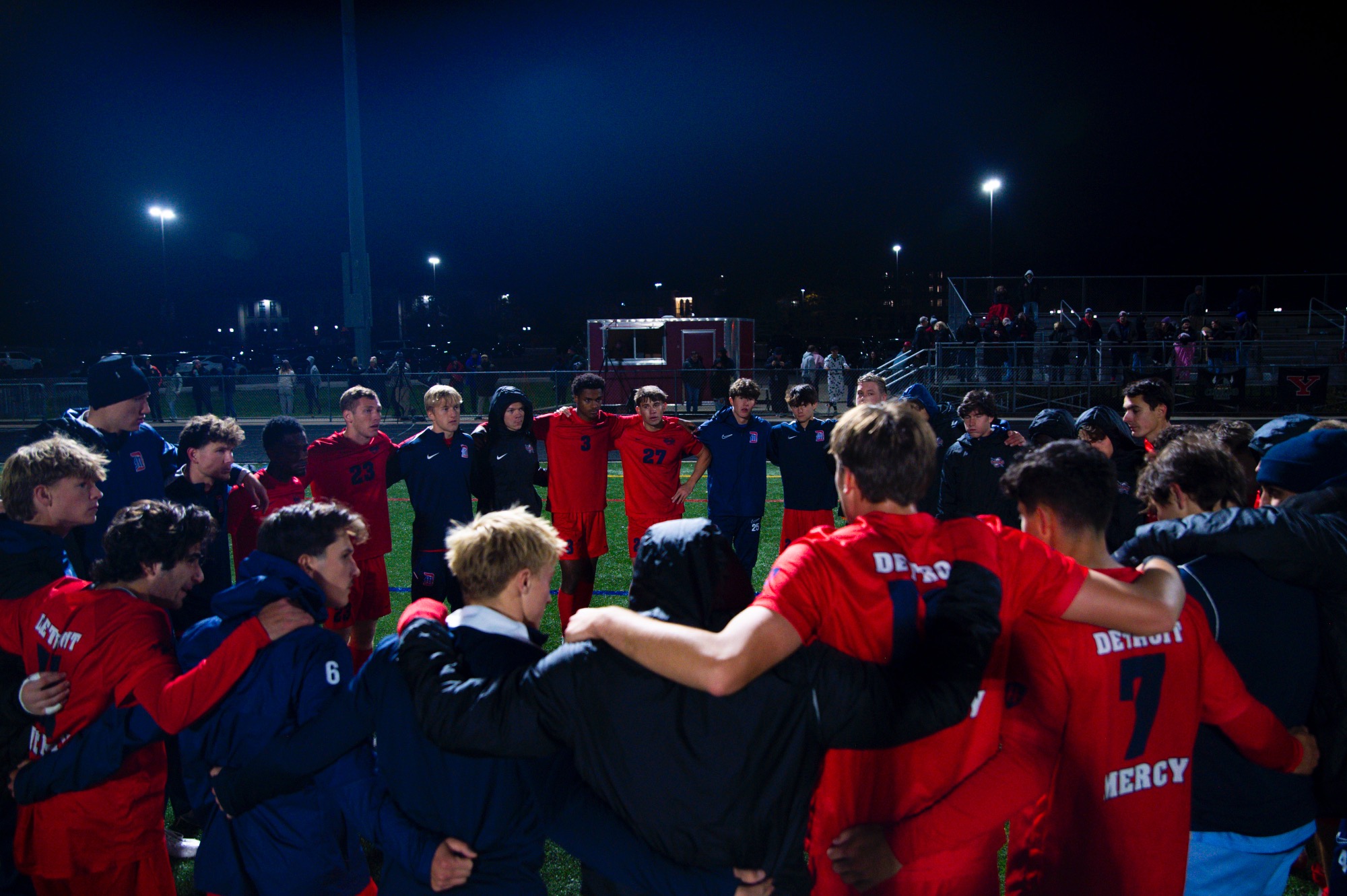The Titans gather after the loss.