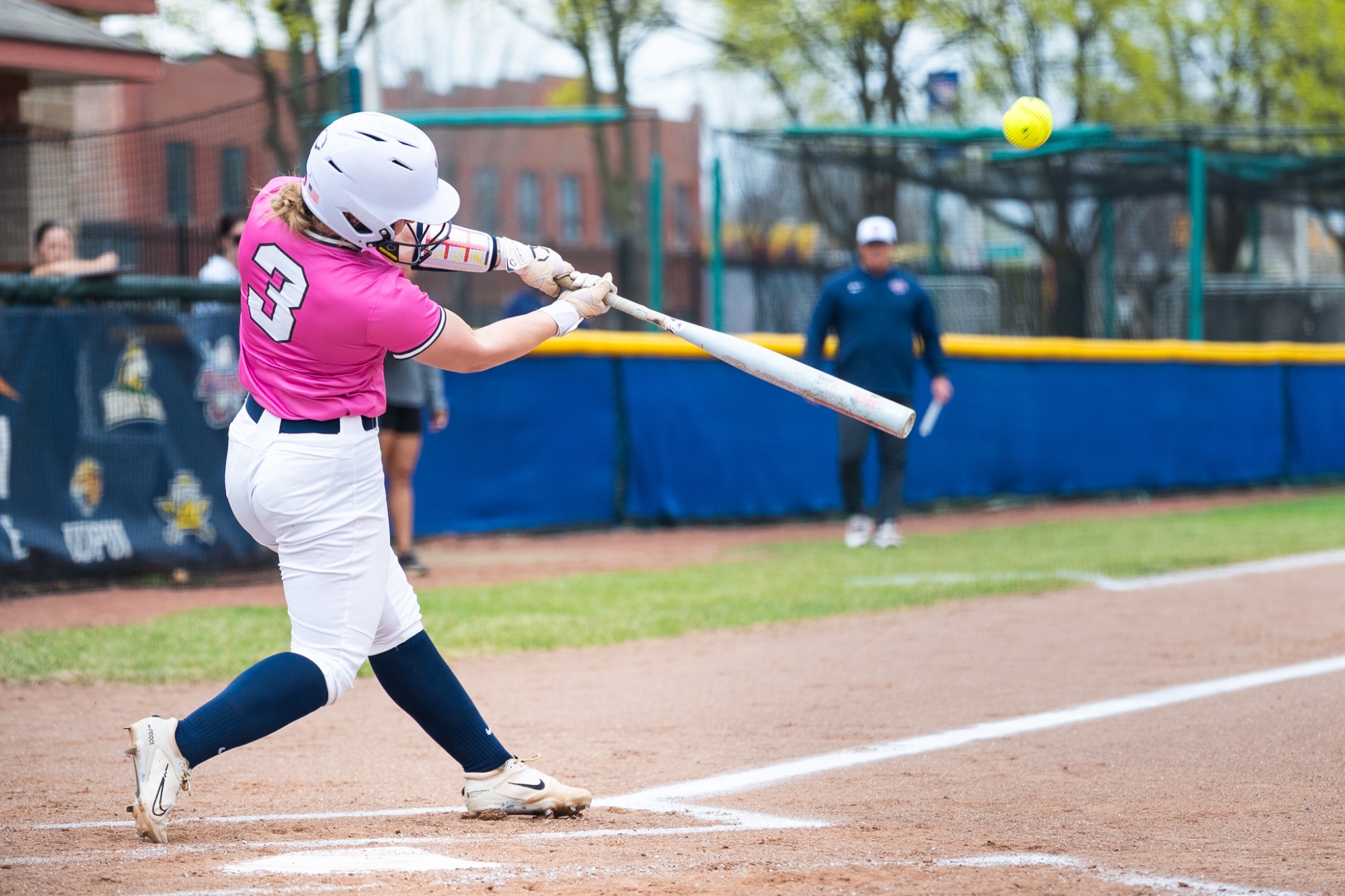 Trinity Fessler hits a home run.