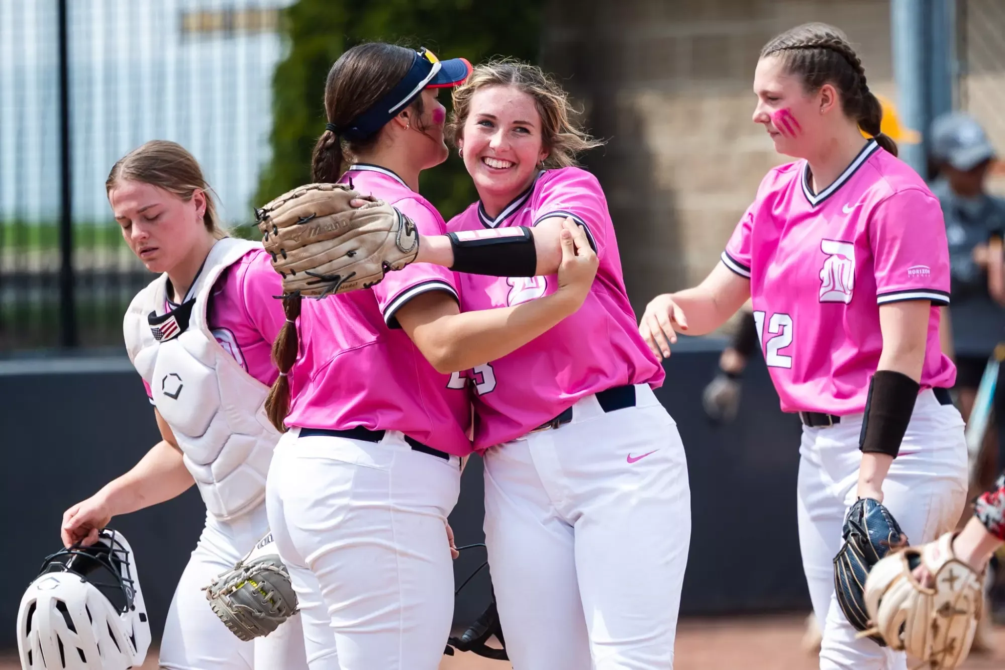 Erin Flynn embraces with Claire Borg