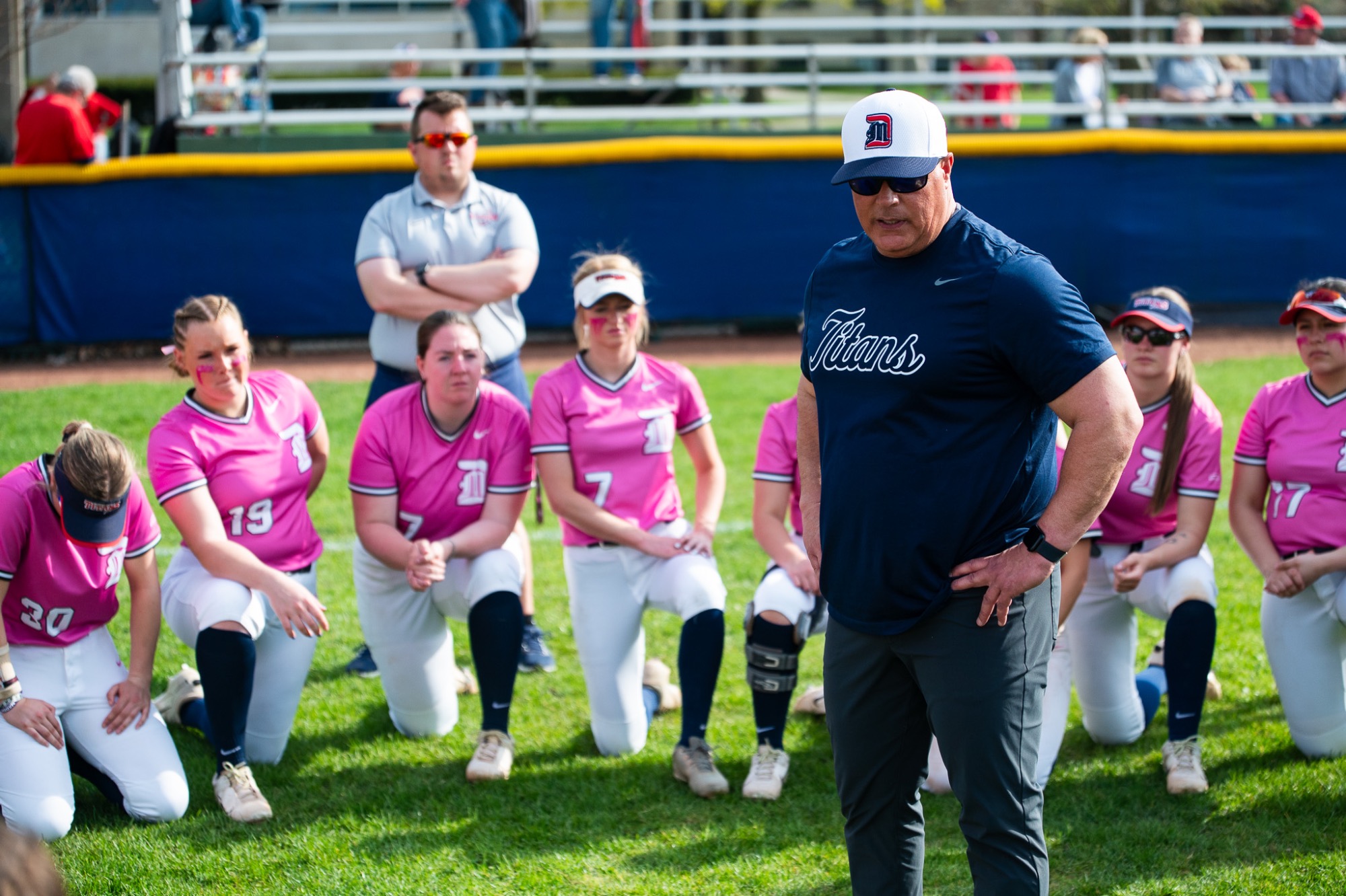 Softball Head Coach Dan Vitale addresses the team.