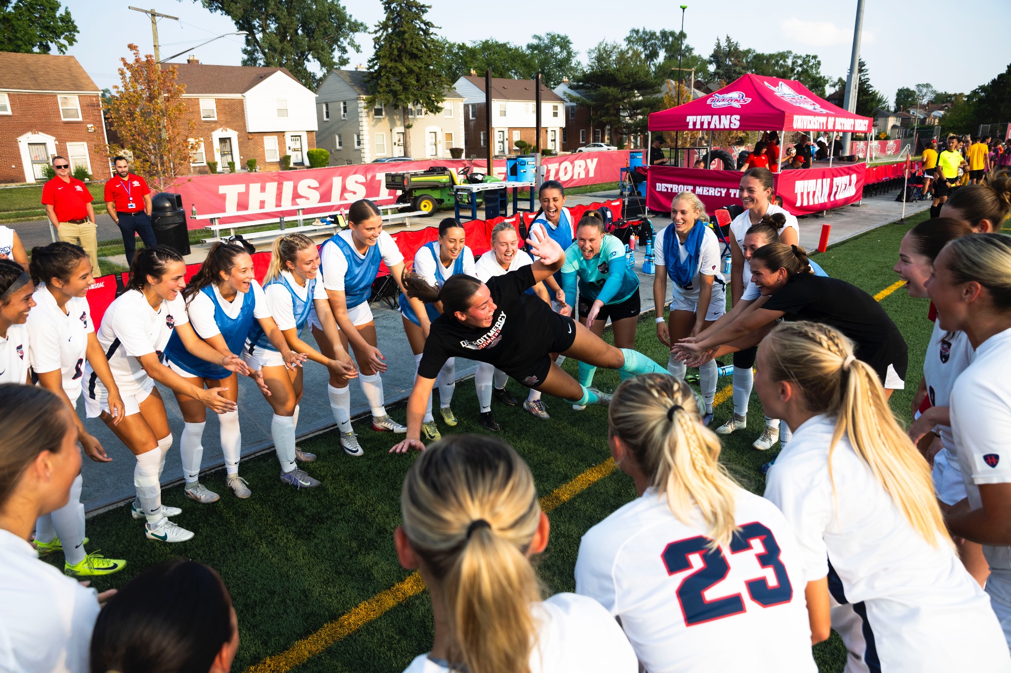 Eva Hill, junior goalkeeper, gets the team excited before kickoff.