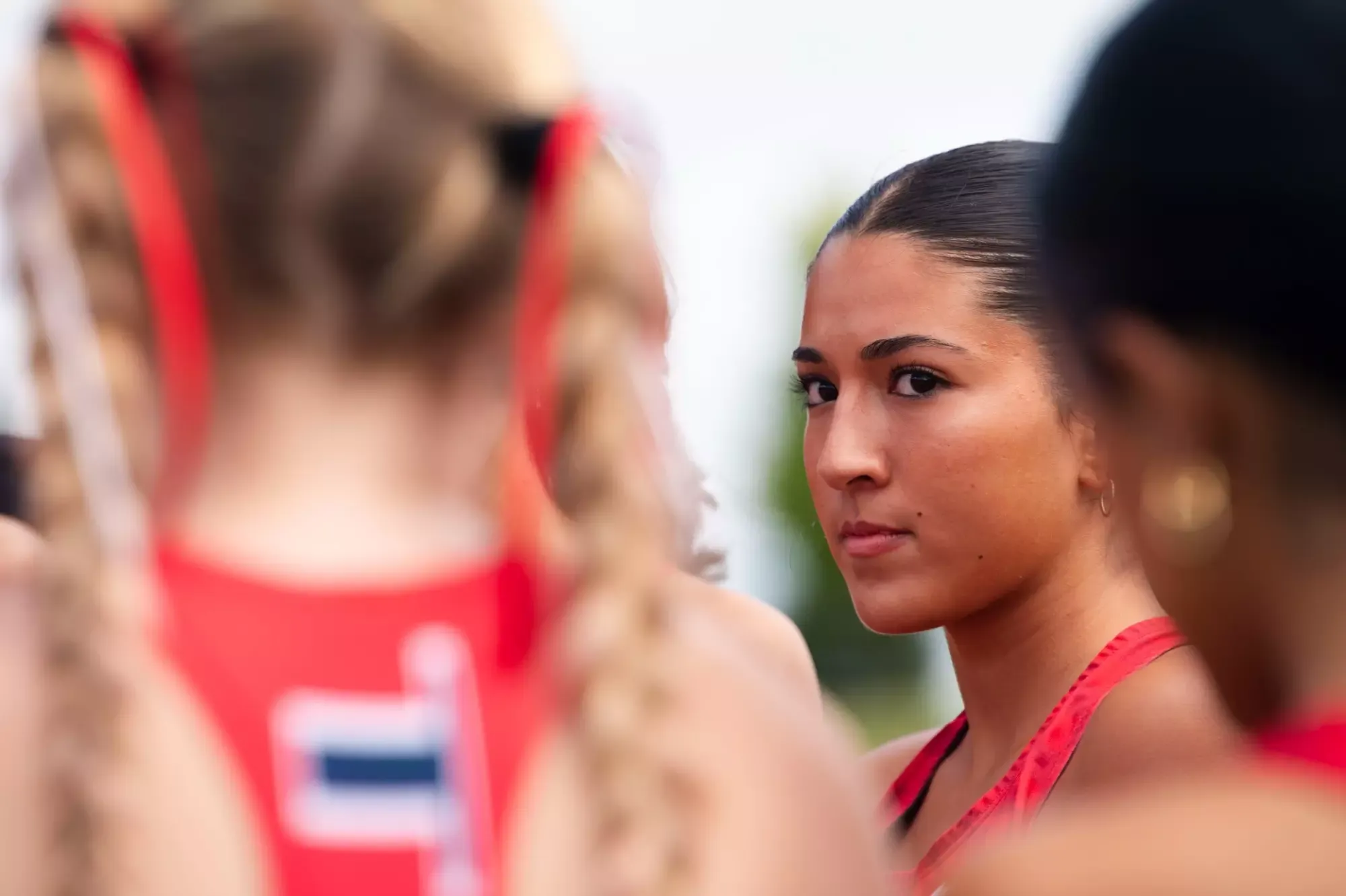 Ana Lopez in the pre-race huddle at Oakland