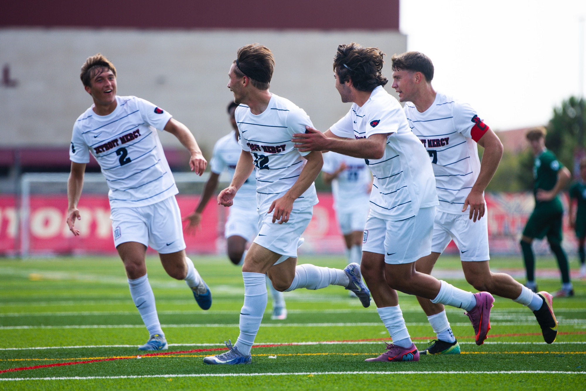 Clayton Lafayette, RS junior midfielder, celebrates with teammates after scoring. 