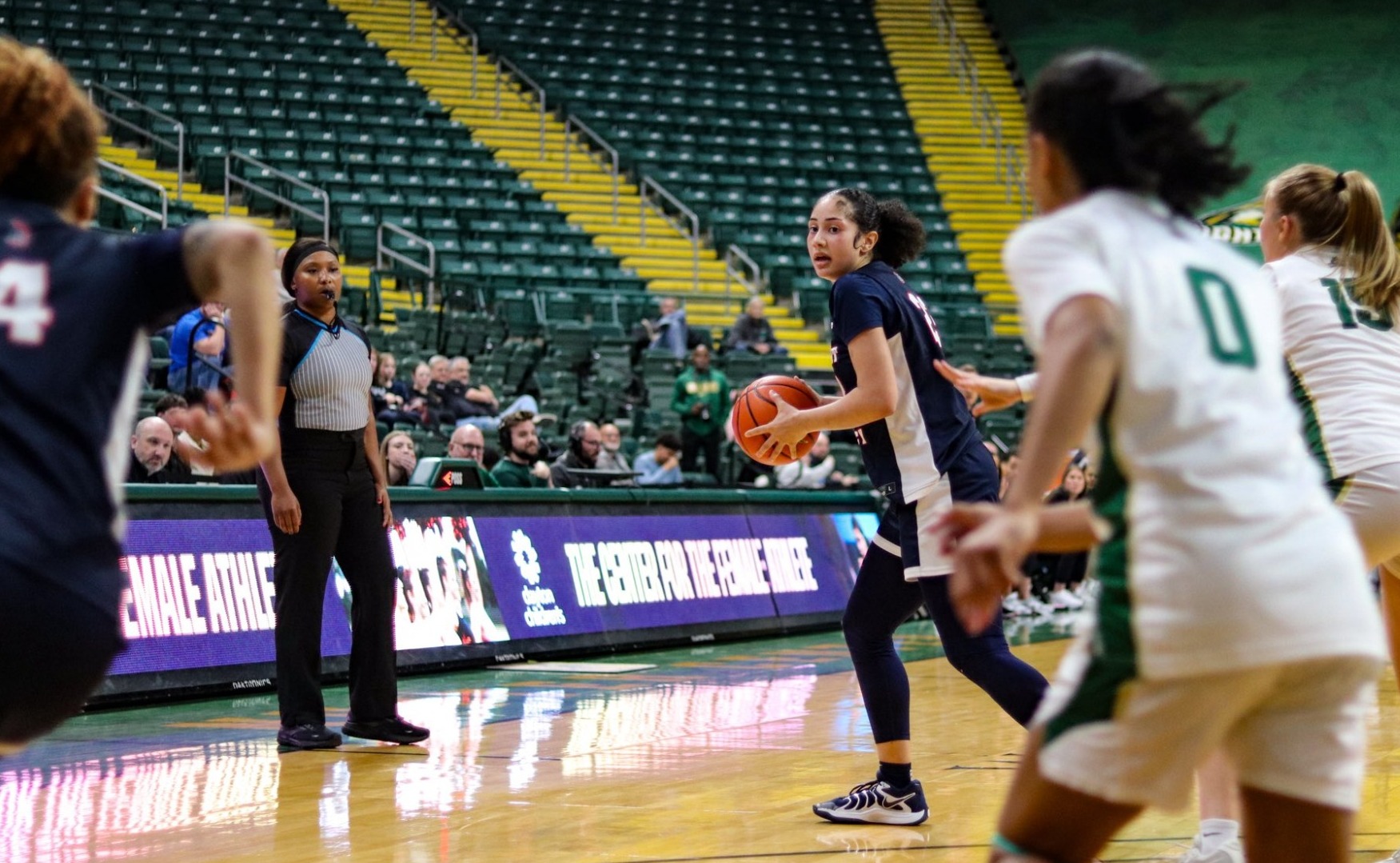 Jasmine Edwards looks to pass the ball