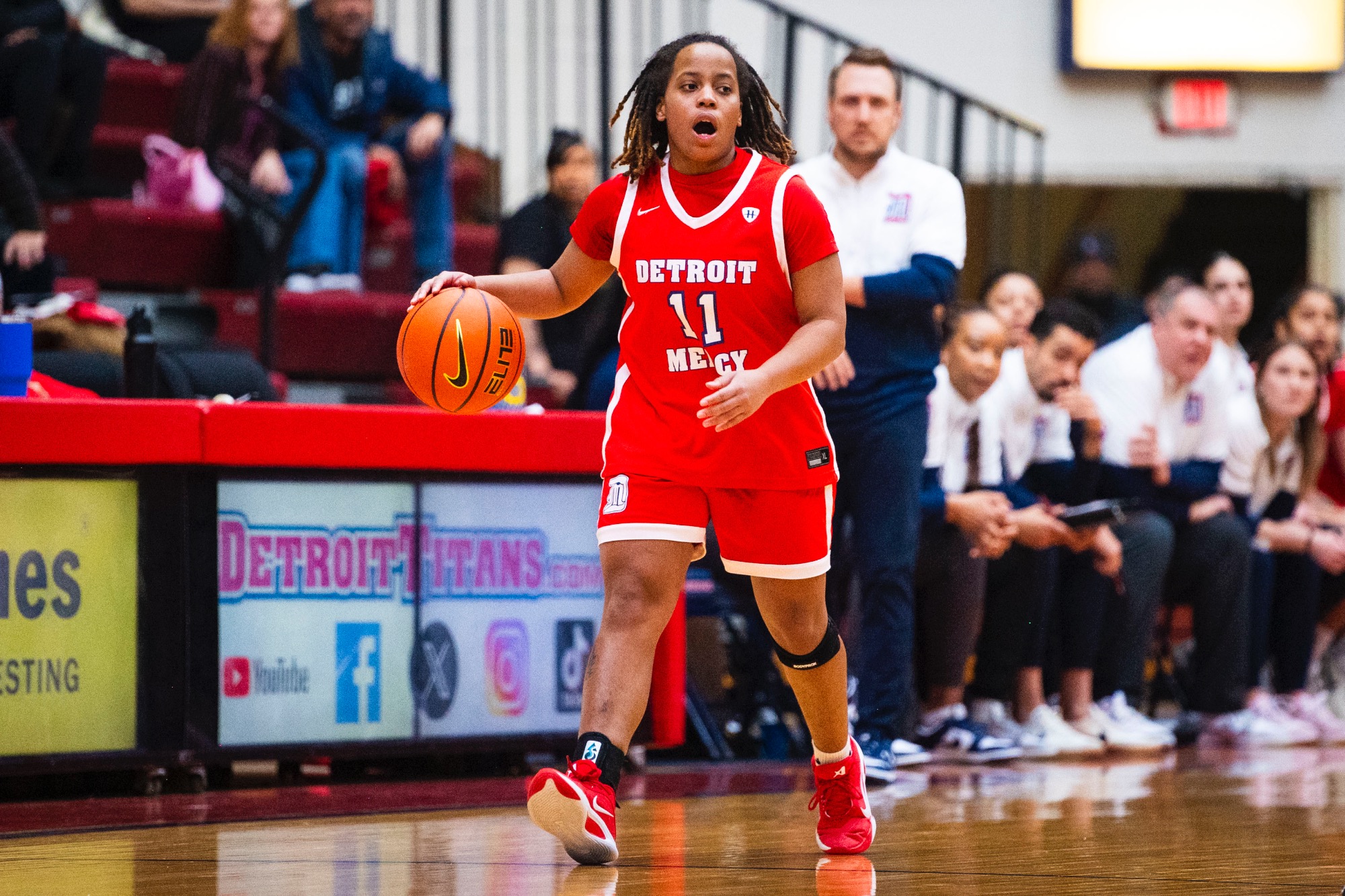 Kailee Davis, graduate guard, handles the ball.