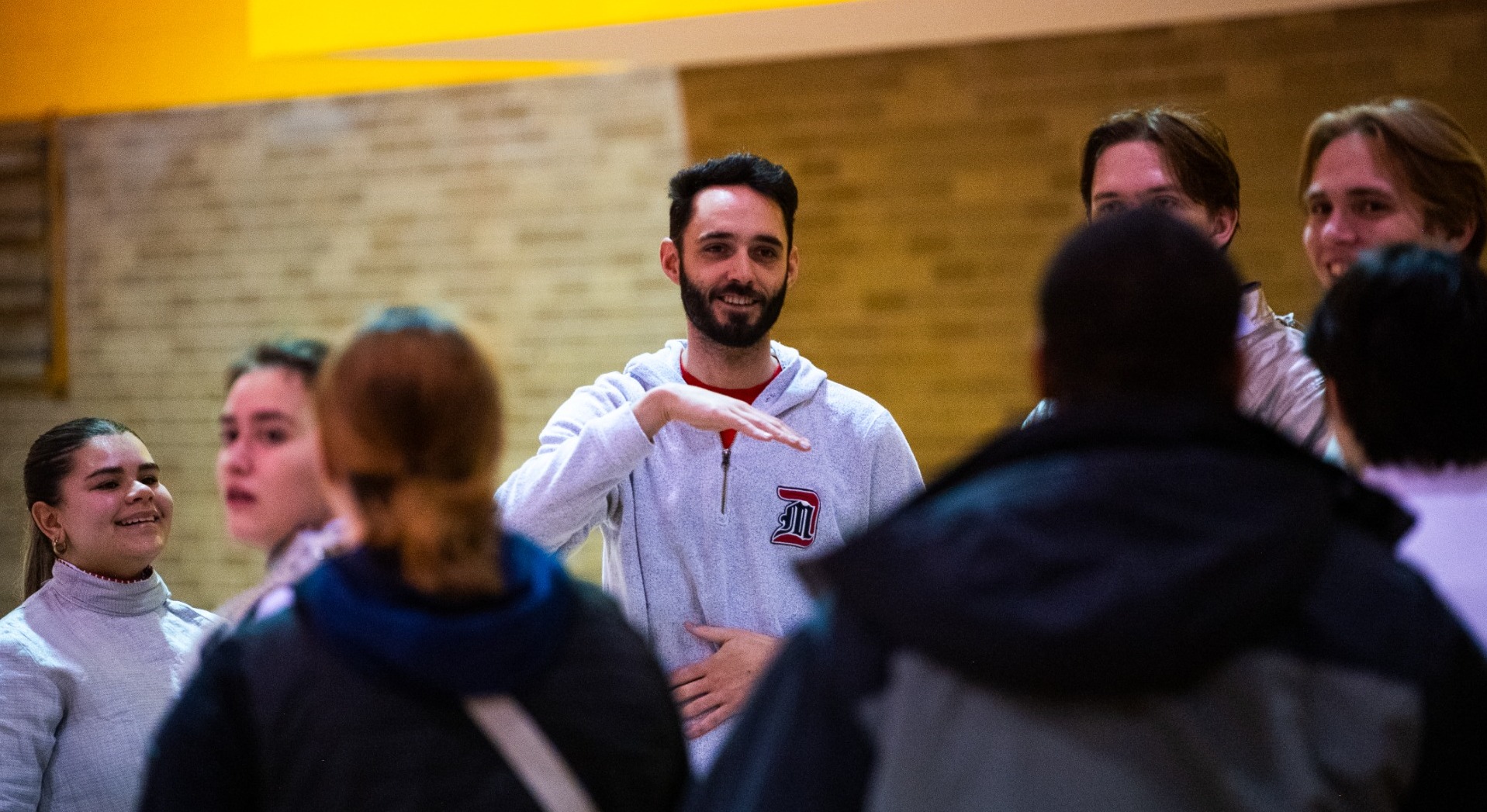 Head Coach Michael Ramlow talks to the team