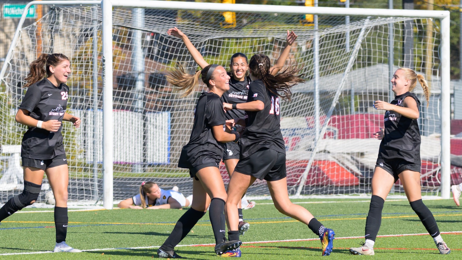 Freshman Gabriella Gojcaj scores her first collegiate goal and celebrates with teammates