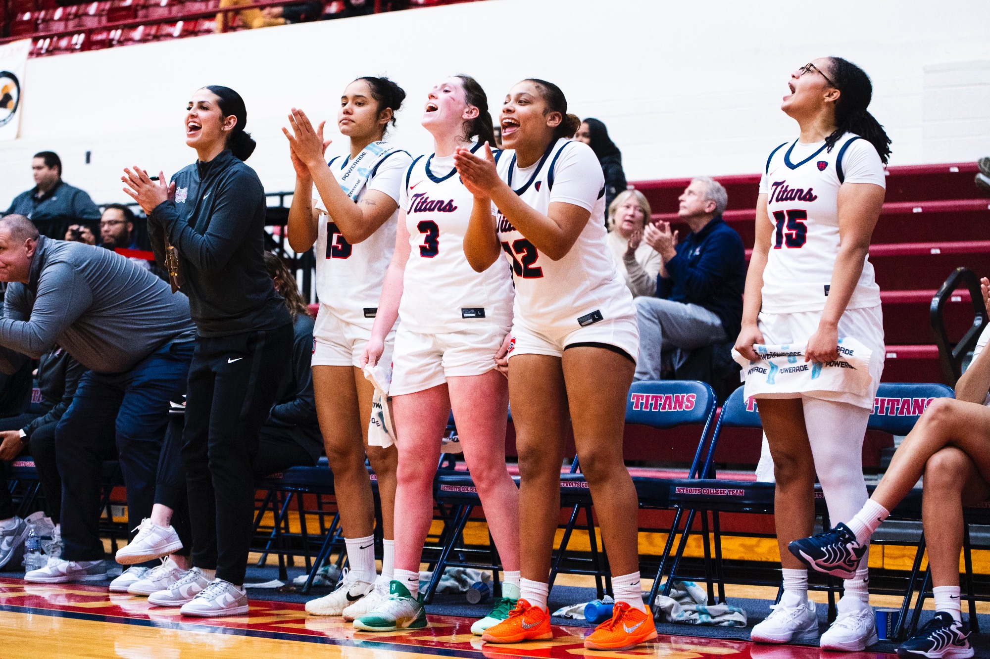 The Titans react from the bench.