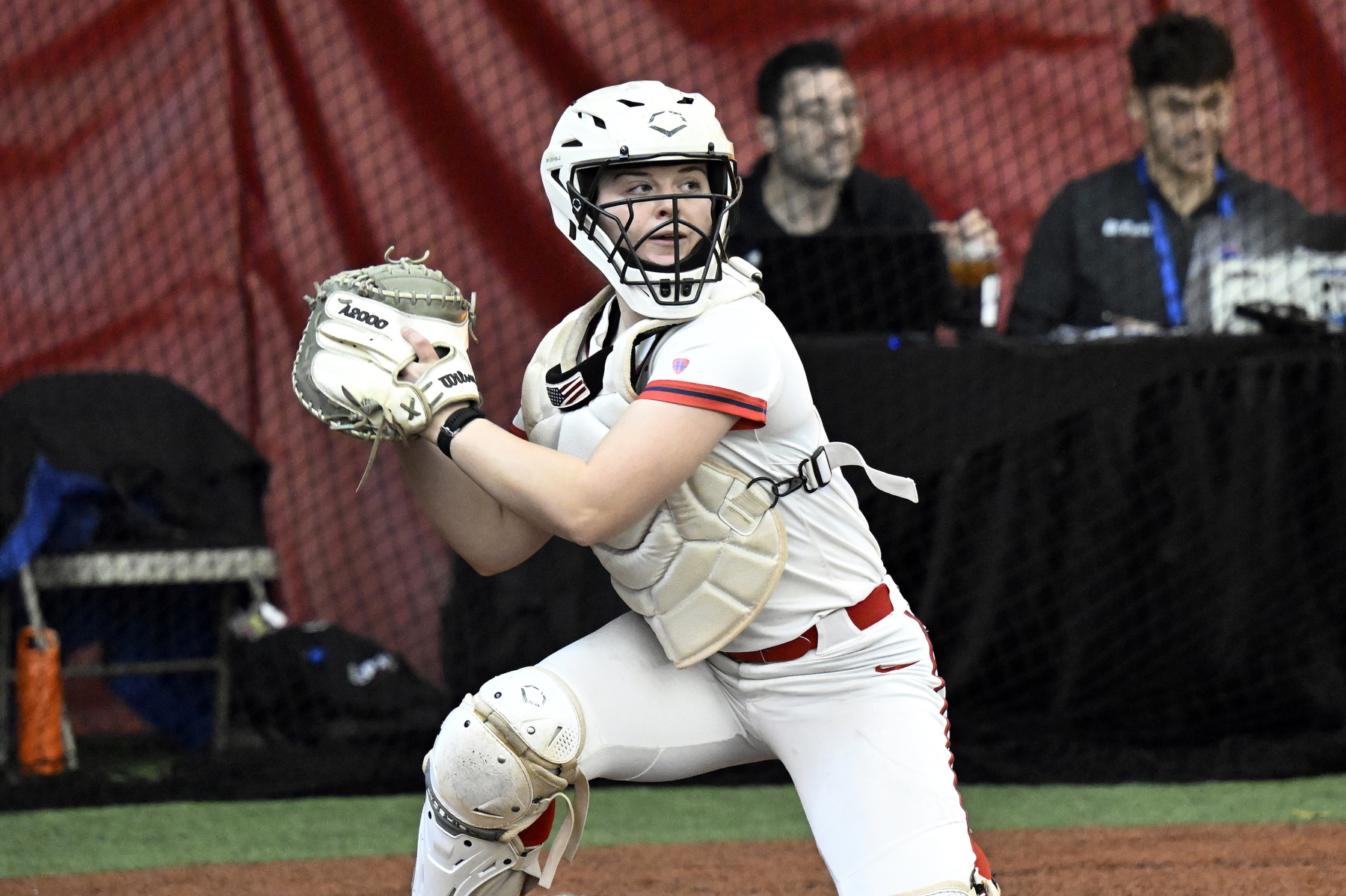 Detroit Mercy catcher Trinity Fessler (3) prepares to throw the ball against Drake University, Friday, February 6, 2025, at The Dome at the Parkway Bank Sports Complex in Rosemont, IL.