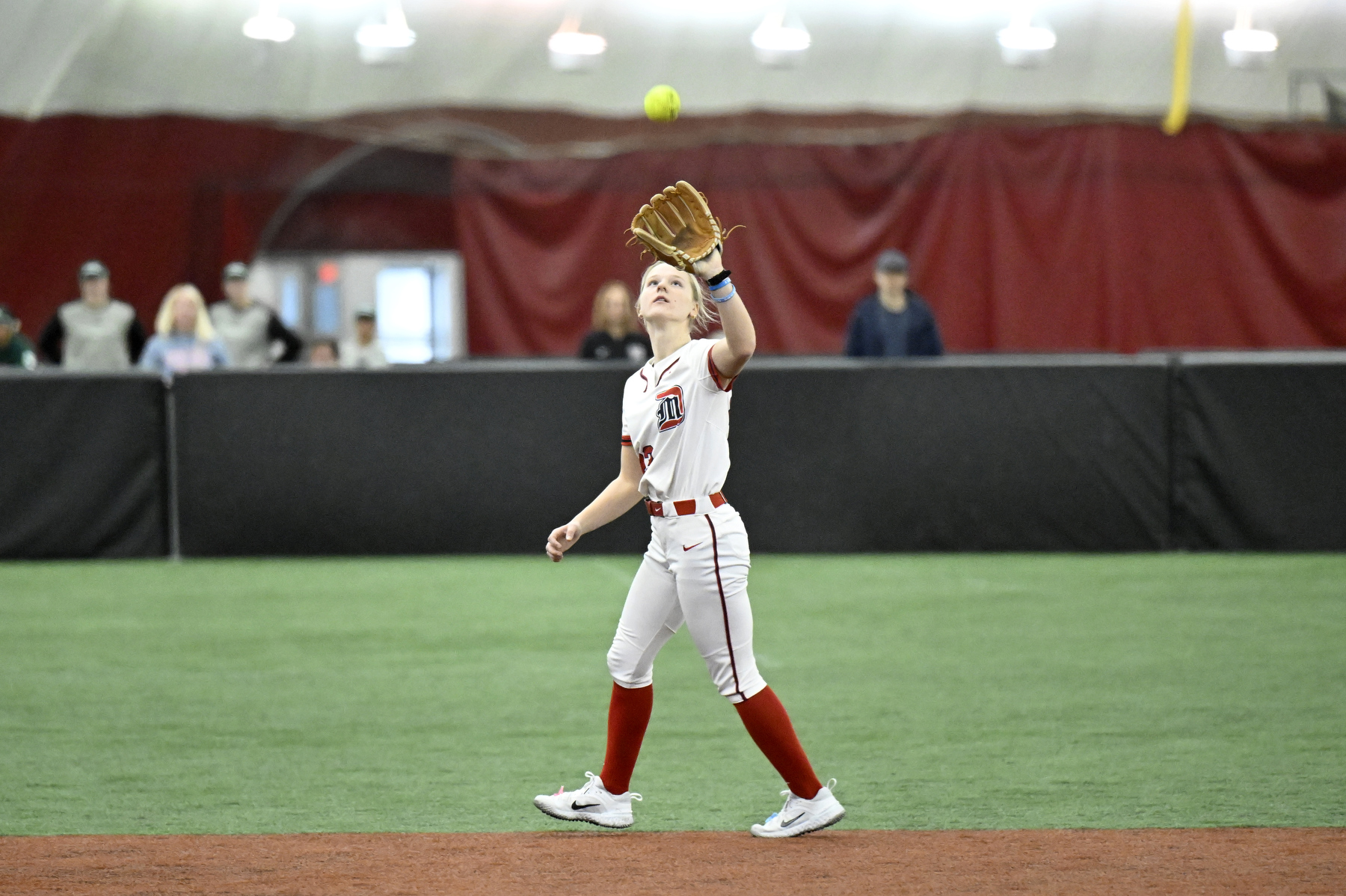 Detroit Mercy second baseman Wendy Ketola (23) makes a catch for an out against Drake University, Friday, February 6, 2025, at The Dome at the Parkway Bank Sports Complex in Rosemont, IL.
