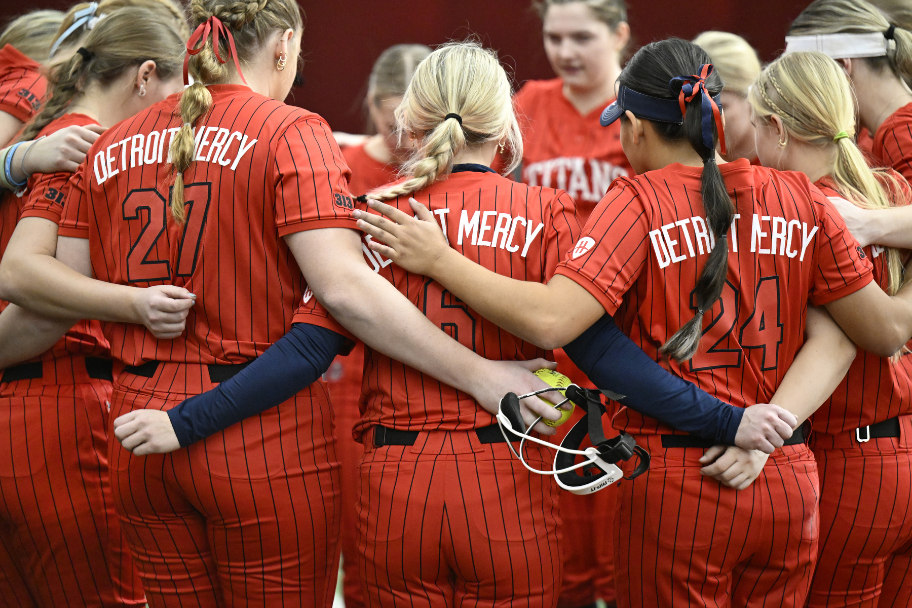 The Detroit Mercy softball team huddles before a game against Valparaiso, Saturday, February 7, 2026, at The Dome at the Parkway Bank Sports Complex in Rosemont, IL.