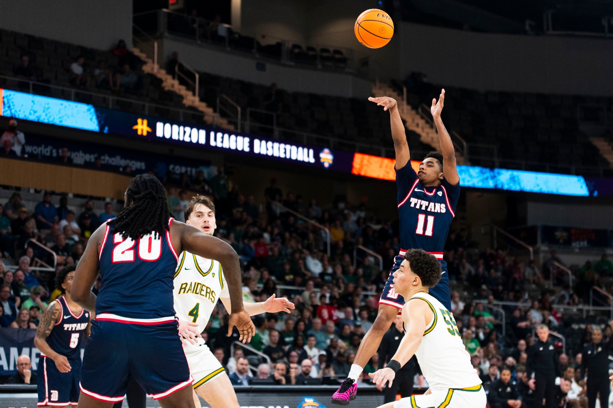 Lance Stone shoots a three 