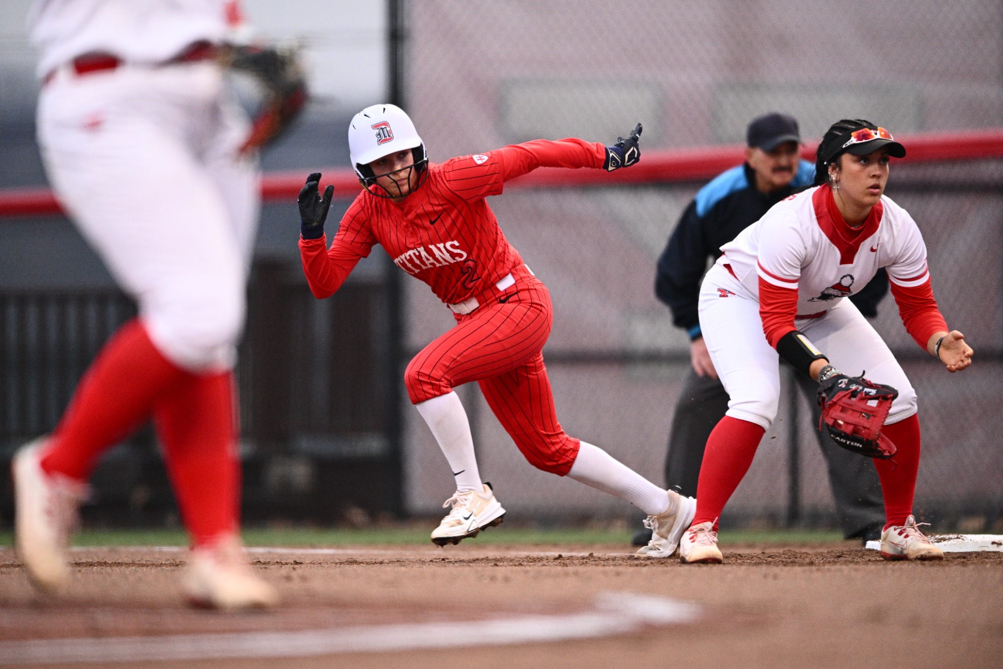 Jenna Higgins takes off from first base