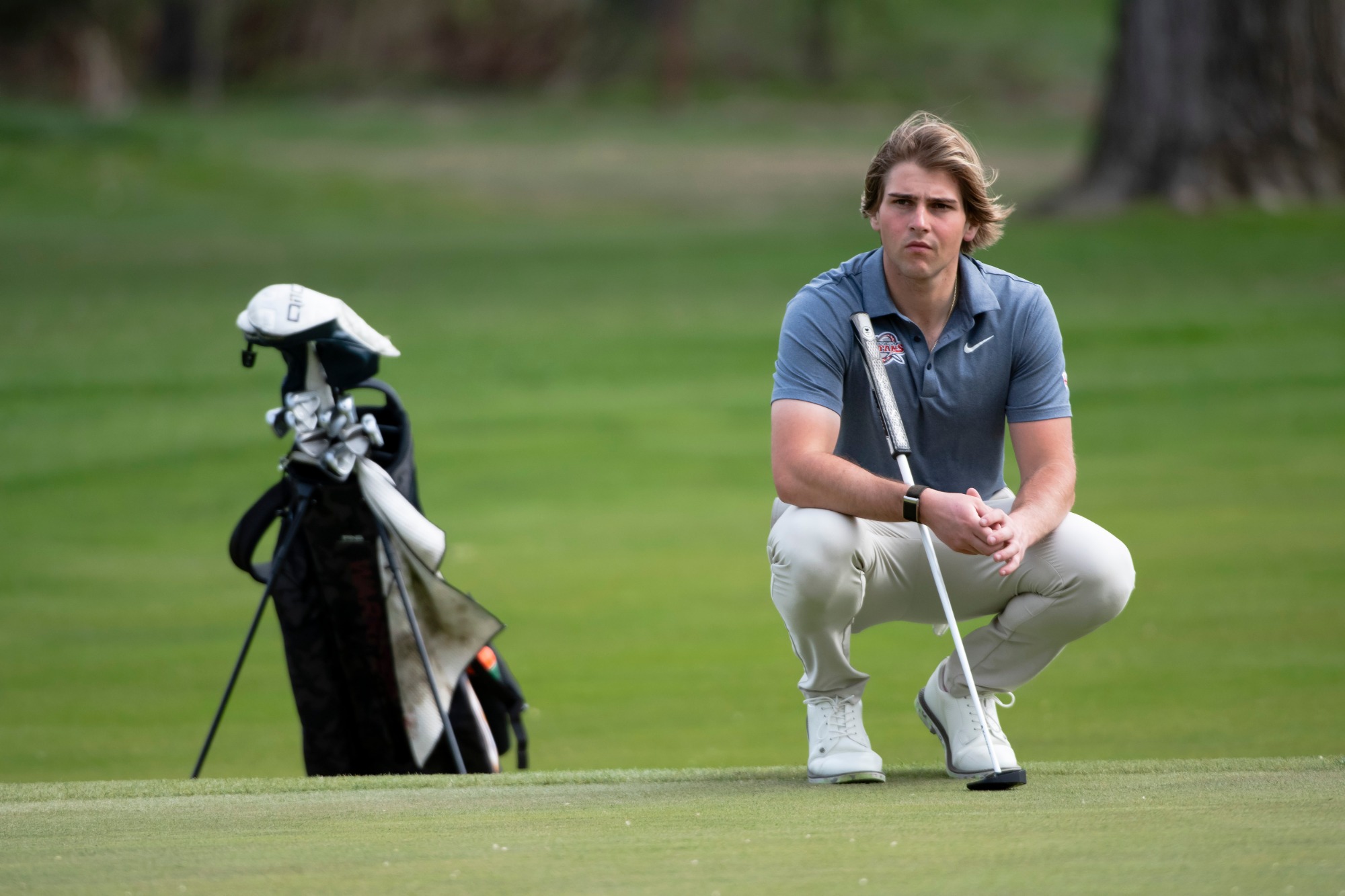 Ethan Oblak looking at the green 