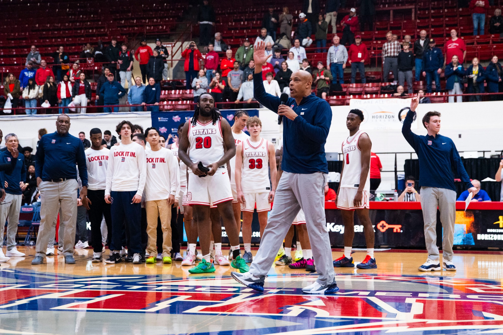 Head coach Mark Montgomery talks to the crowd