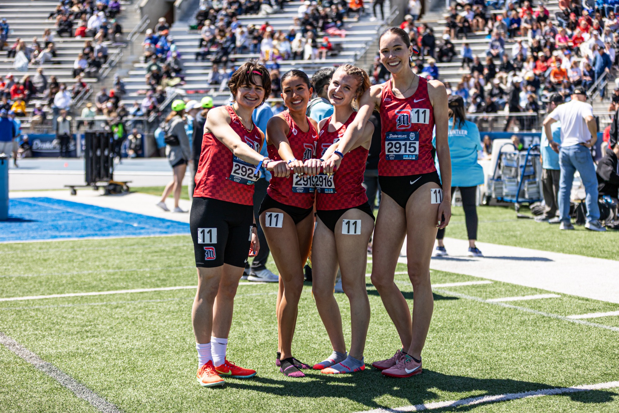 Nina Pizzo, Ana Lopez, Kirsten Koss and Claire Hunt after breaking the 4x 1,600 meter relay school record