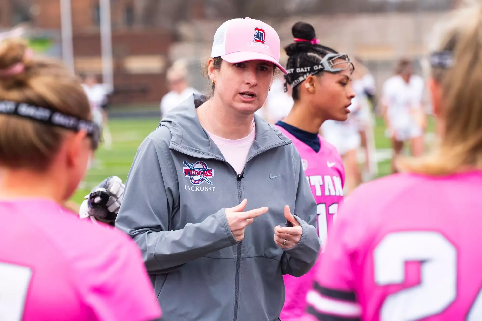 Emma Kuehl talking to the team 