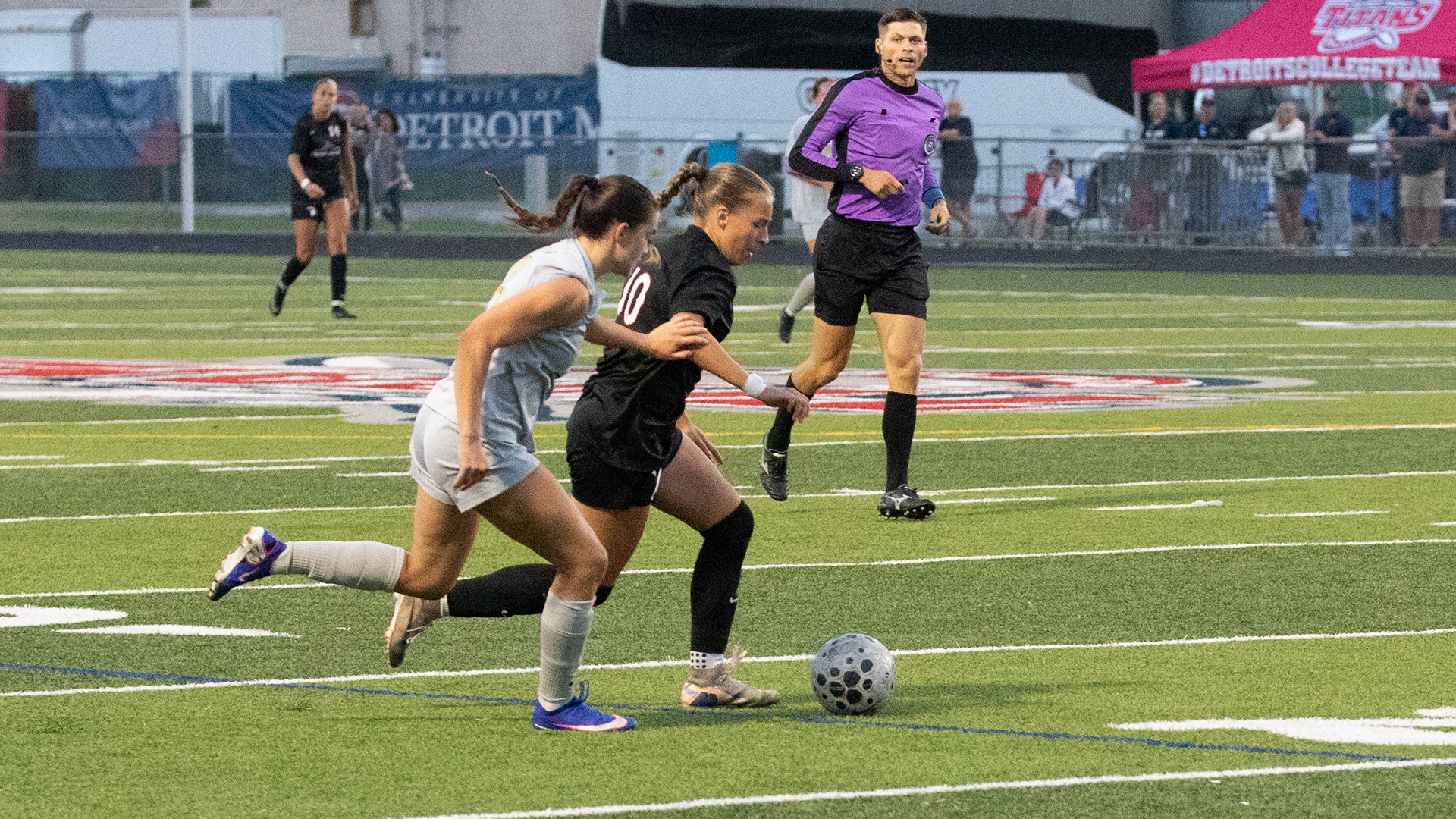 Emma Henry beats a defender