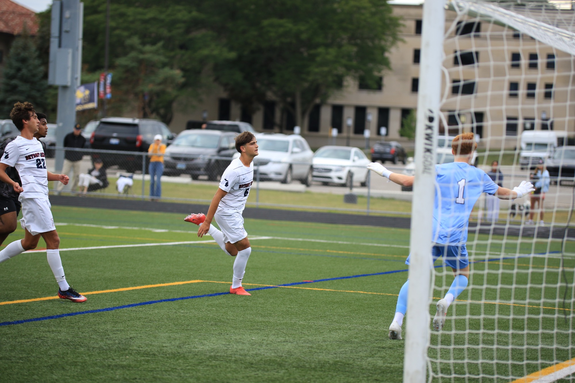 Daniel Kadiu chases one down