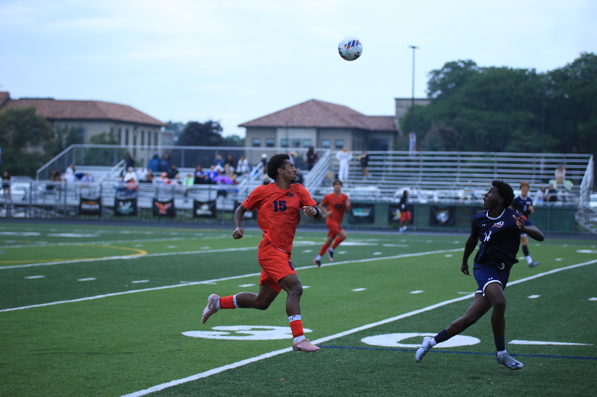 Thero Mitchell III tracks down a long pass