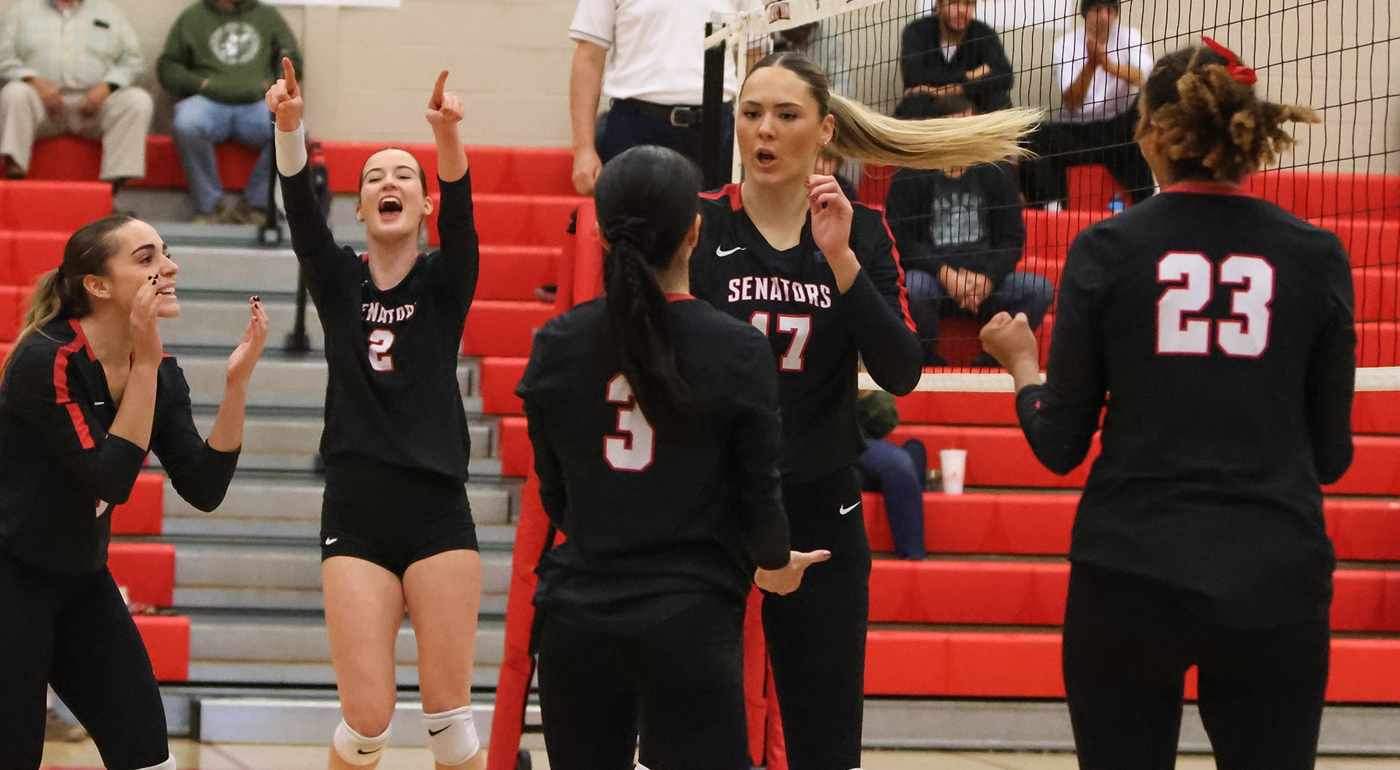 Seniors celebrate a point scored