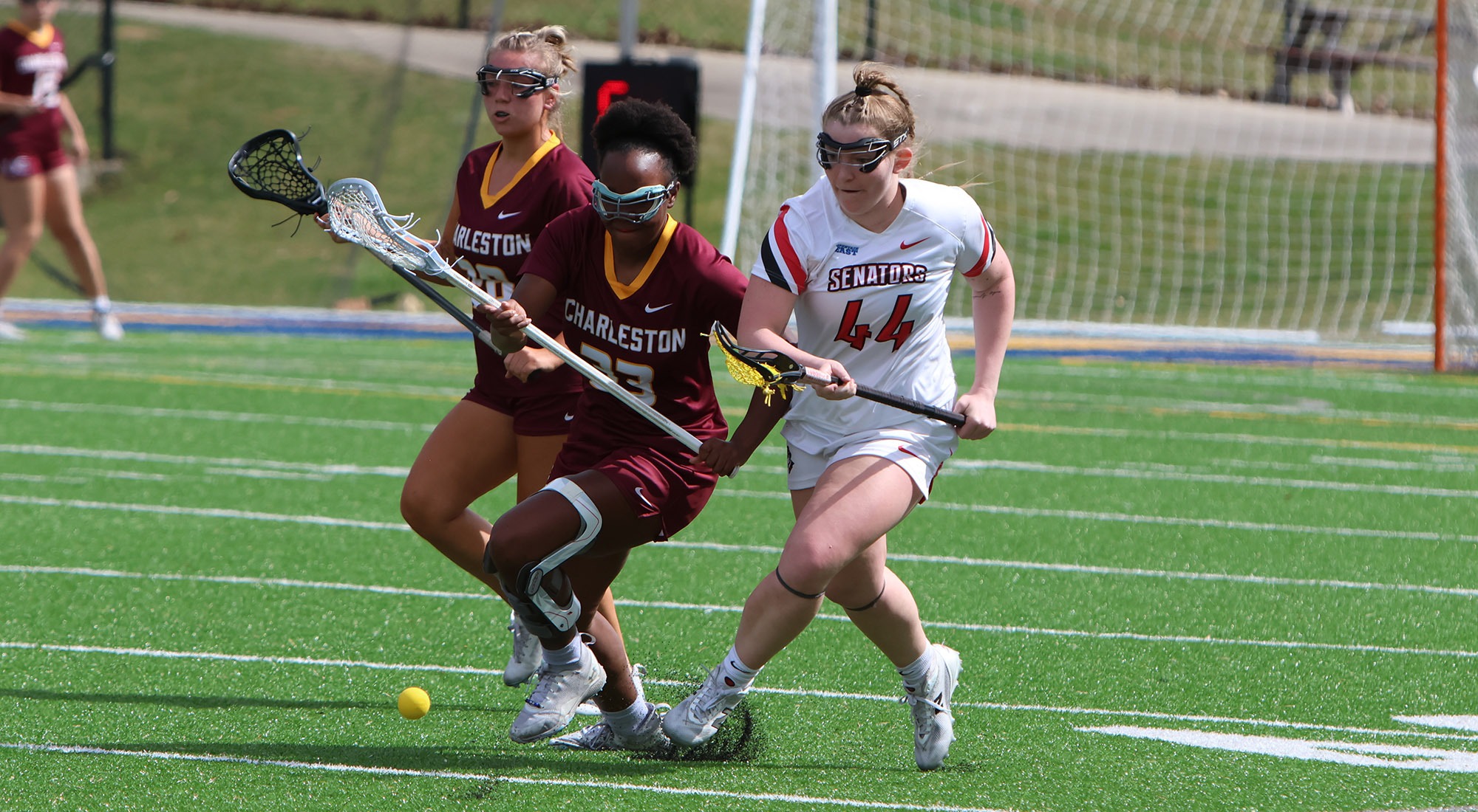 Kelsey Corcoran fights for ground ball