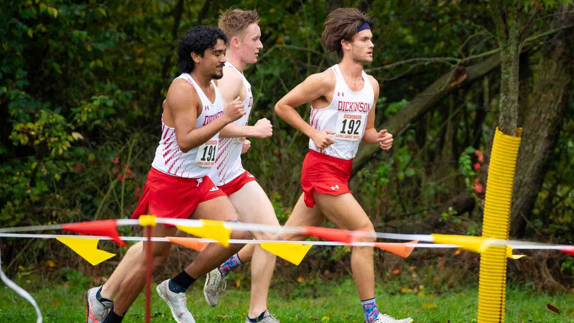 Group of men's cross country runners at the Dickinson Long-Short Invitational on 9-28-24